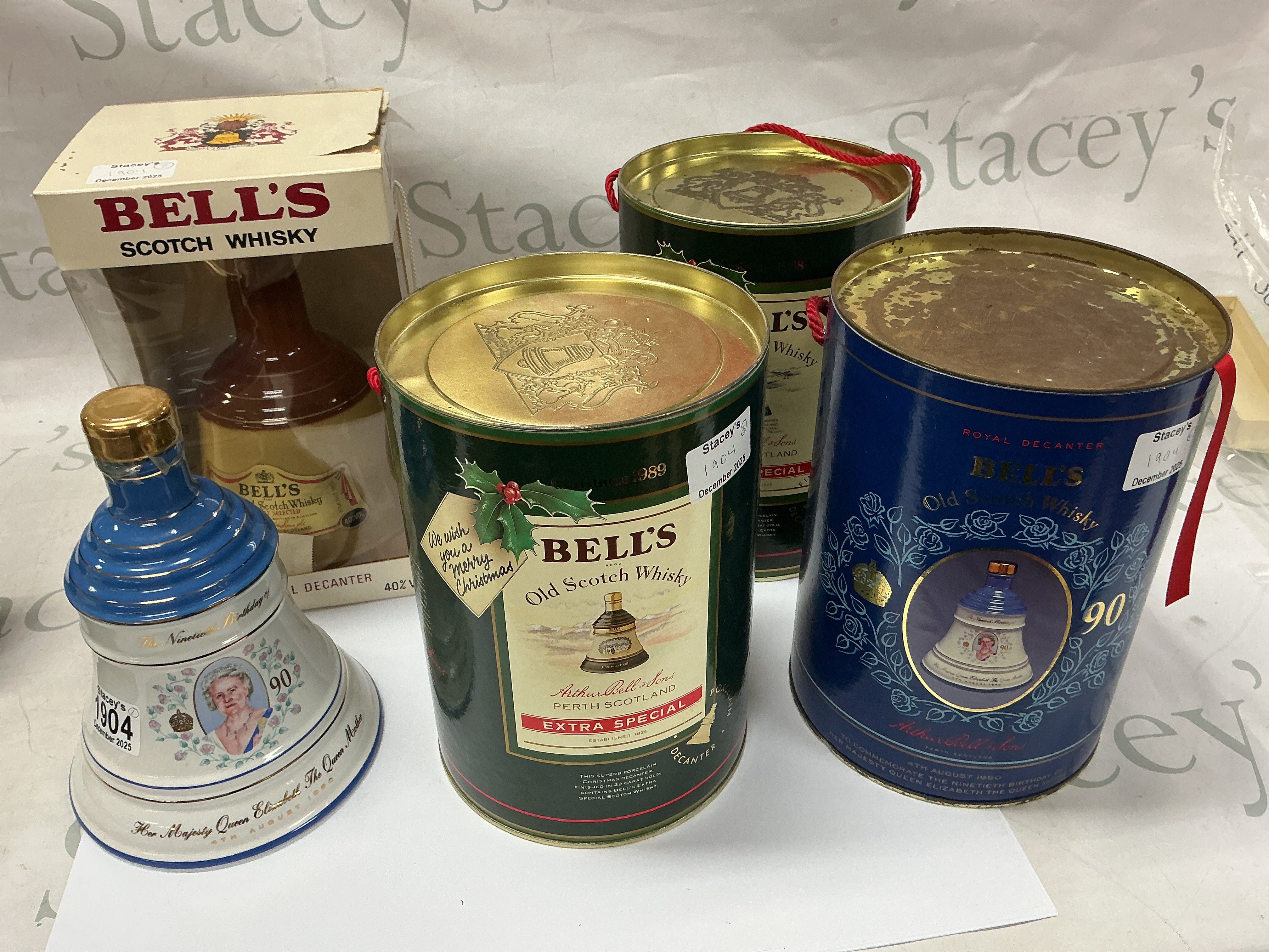 Five bottles of Bell&#2013266057۪s Whiskey. Queen Elizabeth 90th Birthday 75cl (1+2). 75cl Bell Bottle (3). Christmas 1989 75cl (4+5).