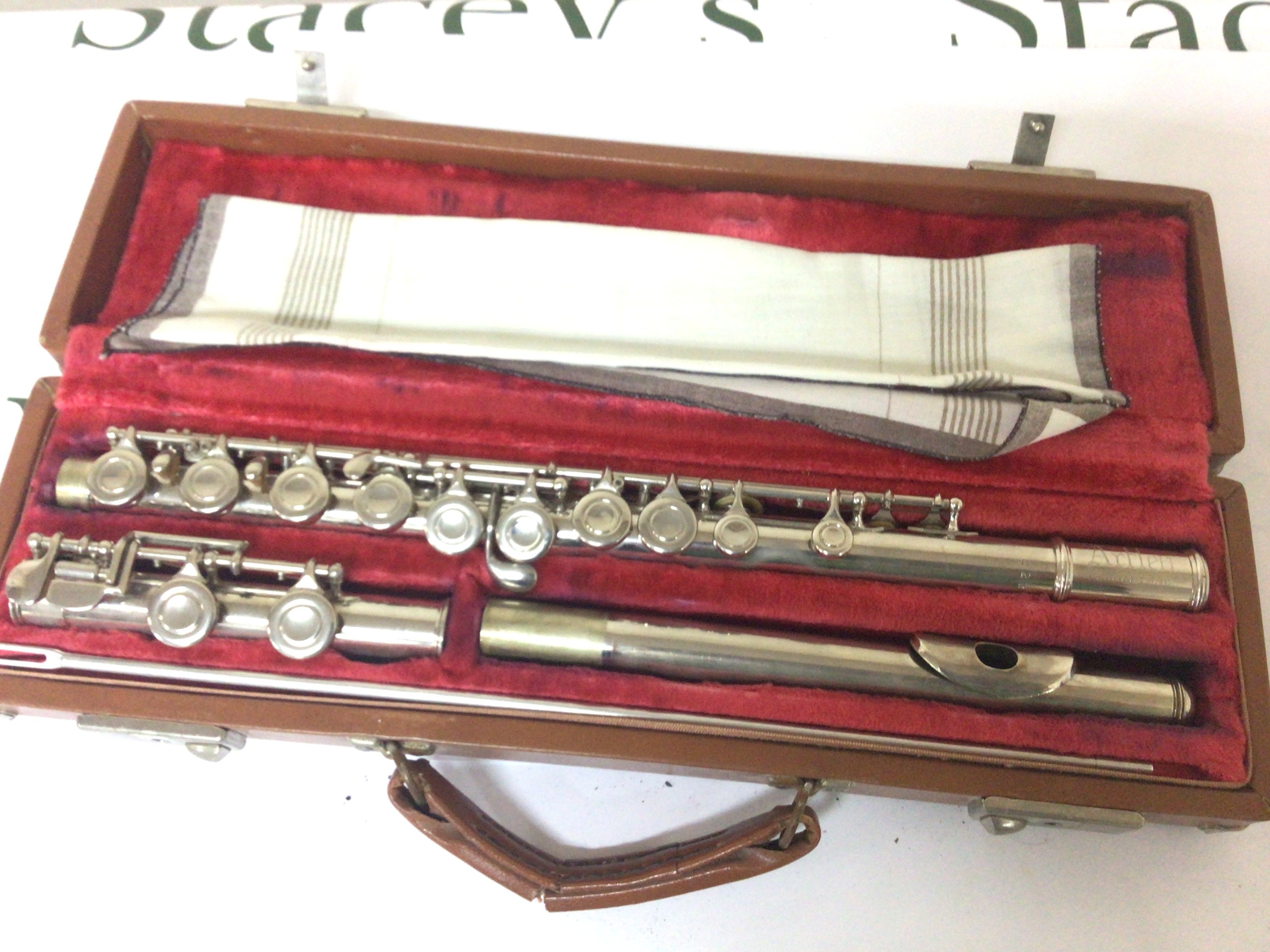 A chrome finished flute maker Artley Elkhart IND serial number 223554 in a fitted case and good condition.
