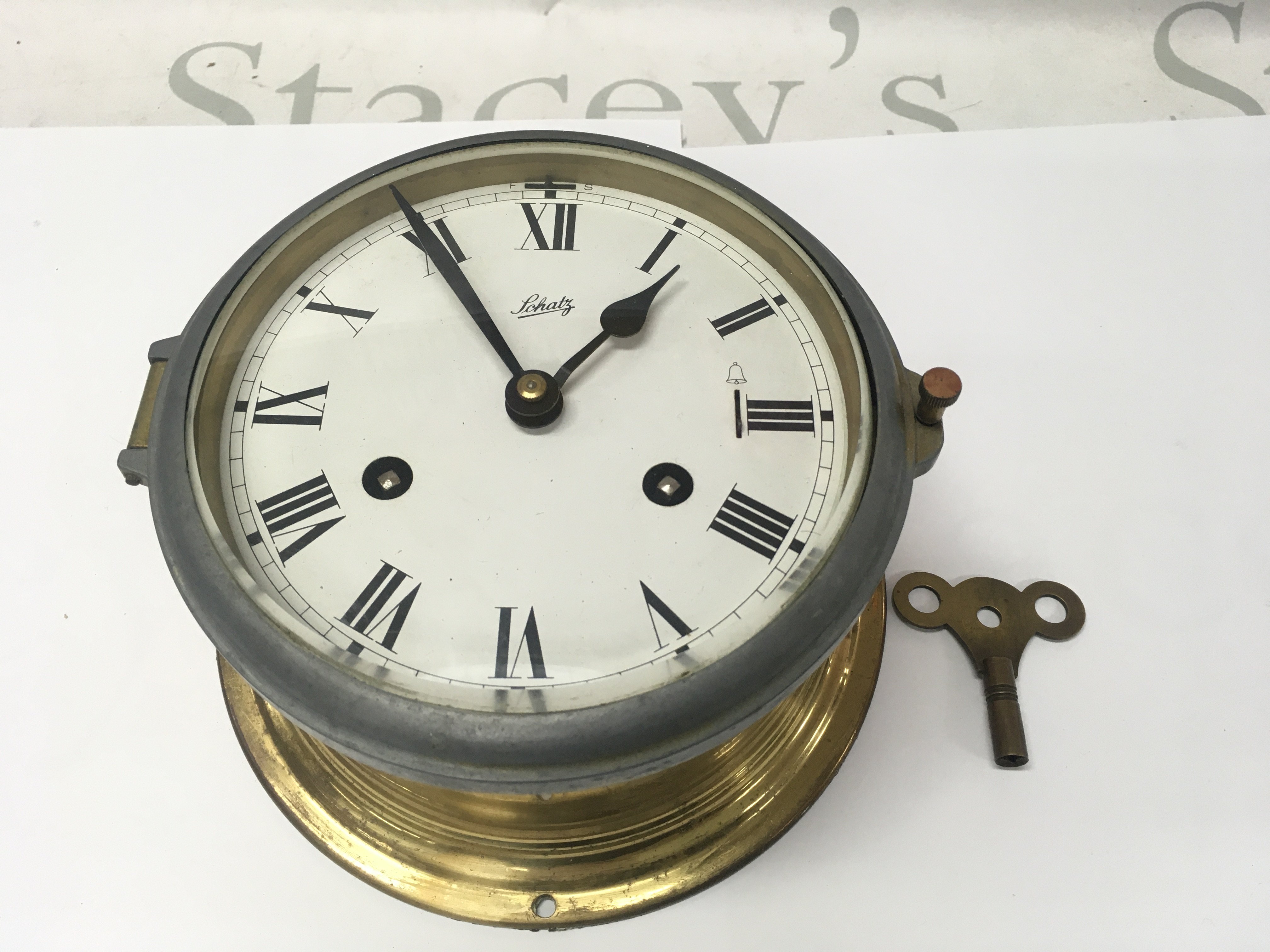 A brass Schatz royal mariner ships clock.