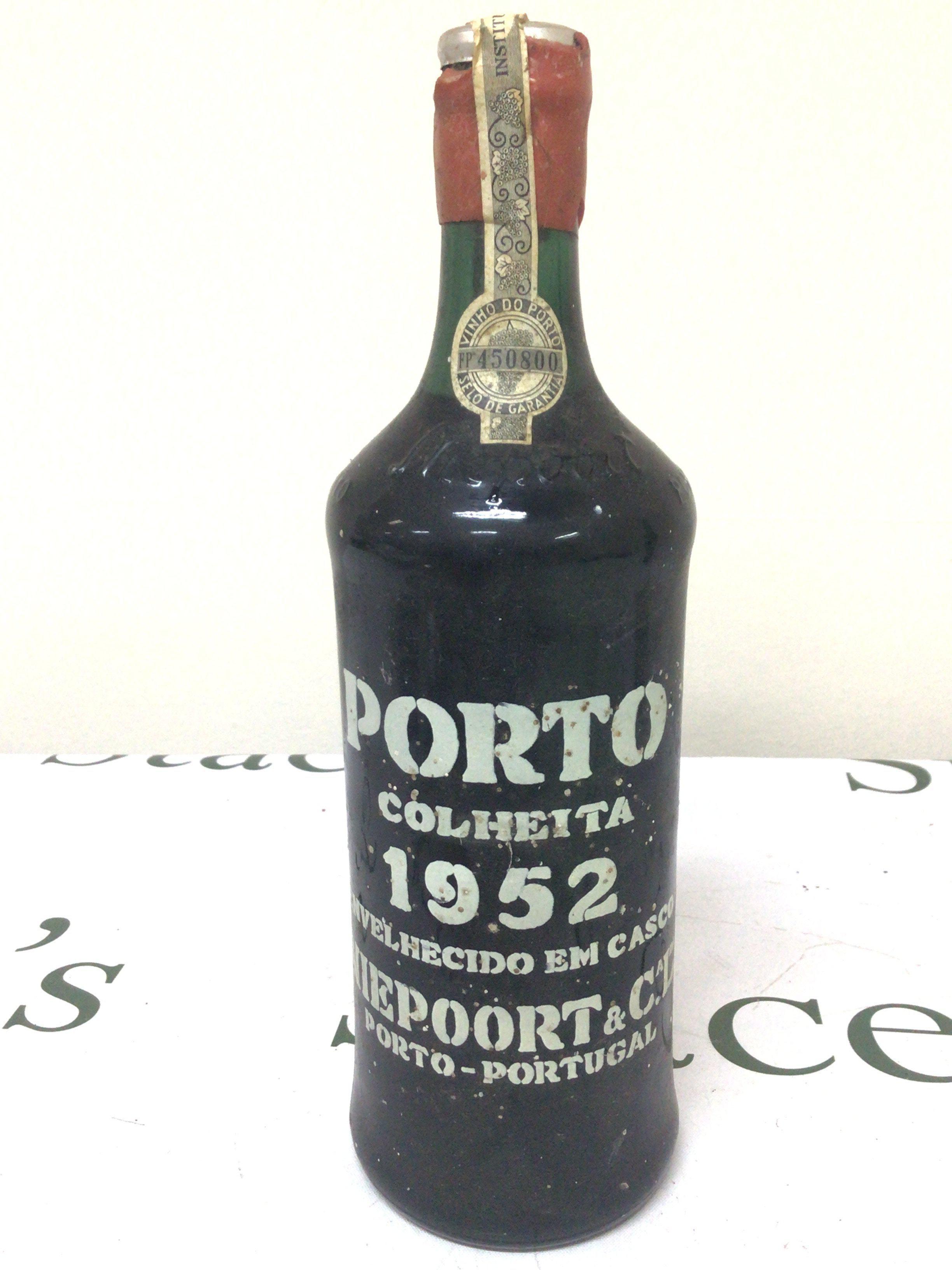 A Vintage 1952 Bottle of Port Porto with sealed top very good level.