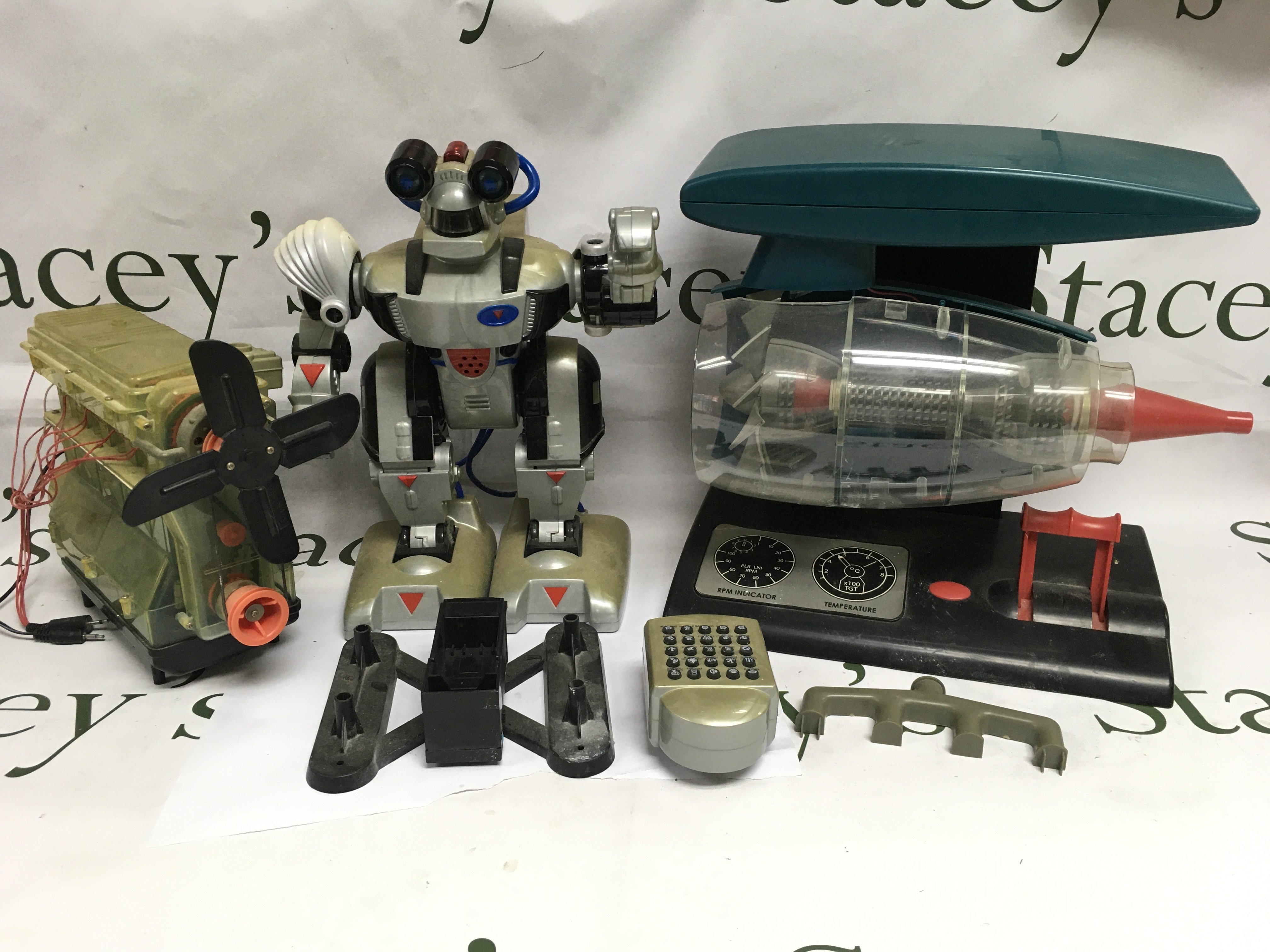 A box of toys and models comprising a robot, turbine etc. Shipping category D.