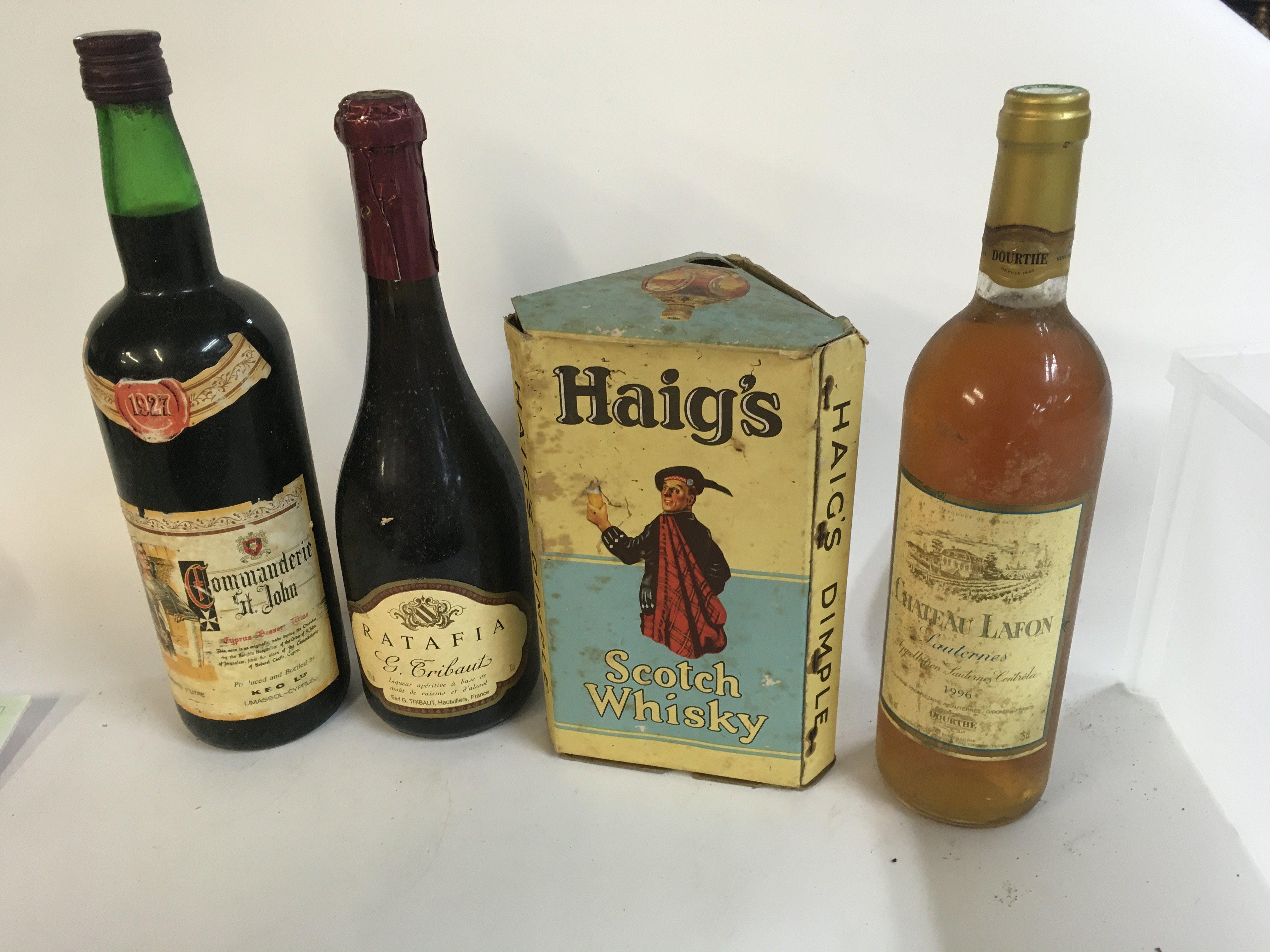 4x bottles of various alcohols consisting of Commanderie St John wine, Ratafia G.Tribaut, Haig&#2013266057۪s dimple scotch whiskey and Chateau Lafon wine