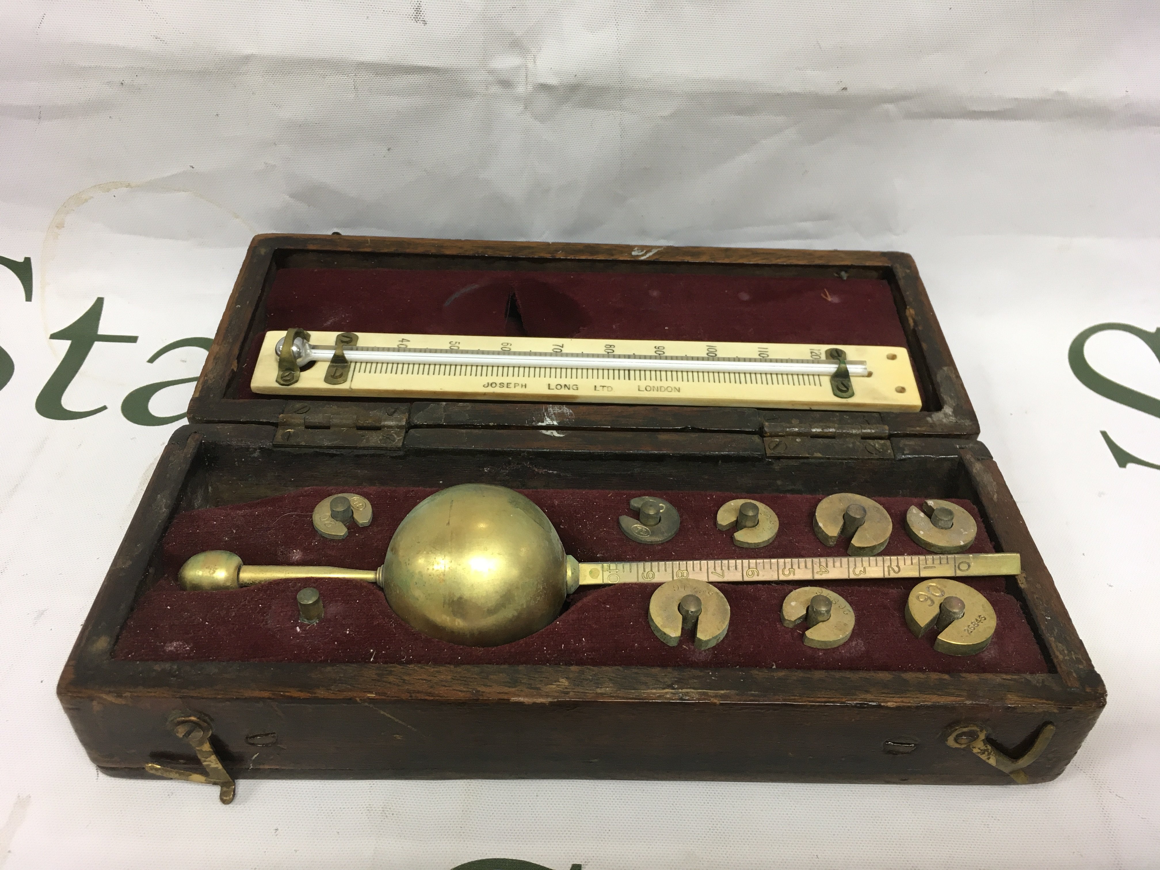 A cased Sikes Hydrometer by Joseph Long Ltd of London. Shipping category D.