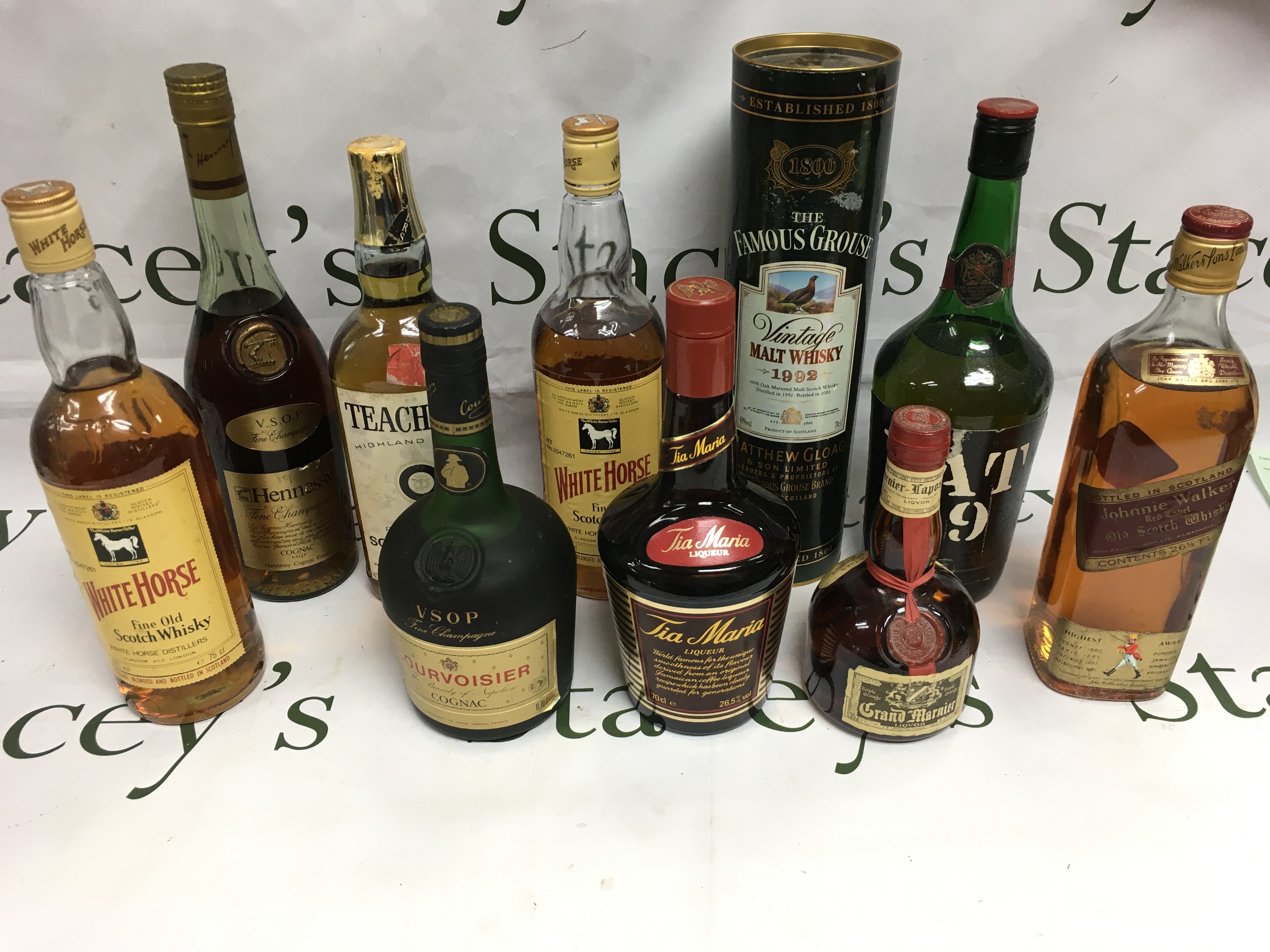Various bottles of spirits comprising Whisky, Cognac and others. Shipping category D.