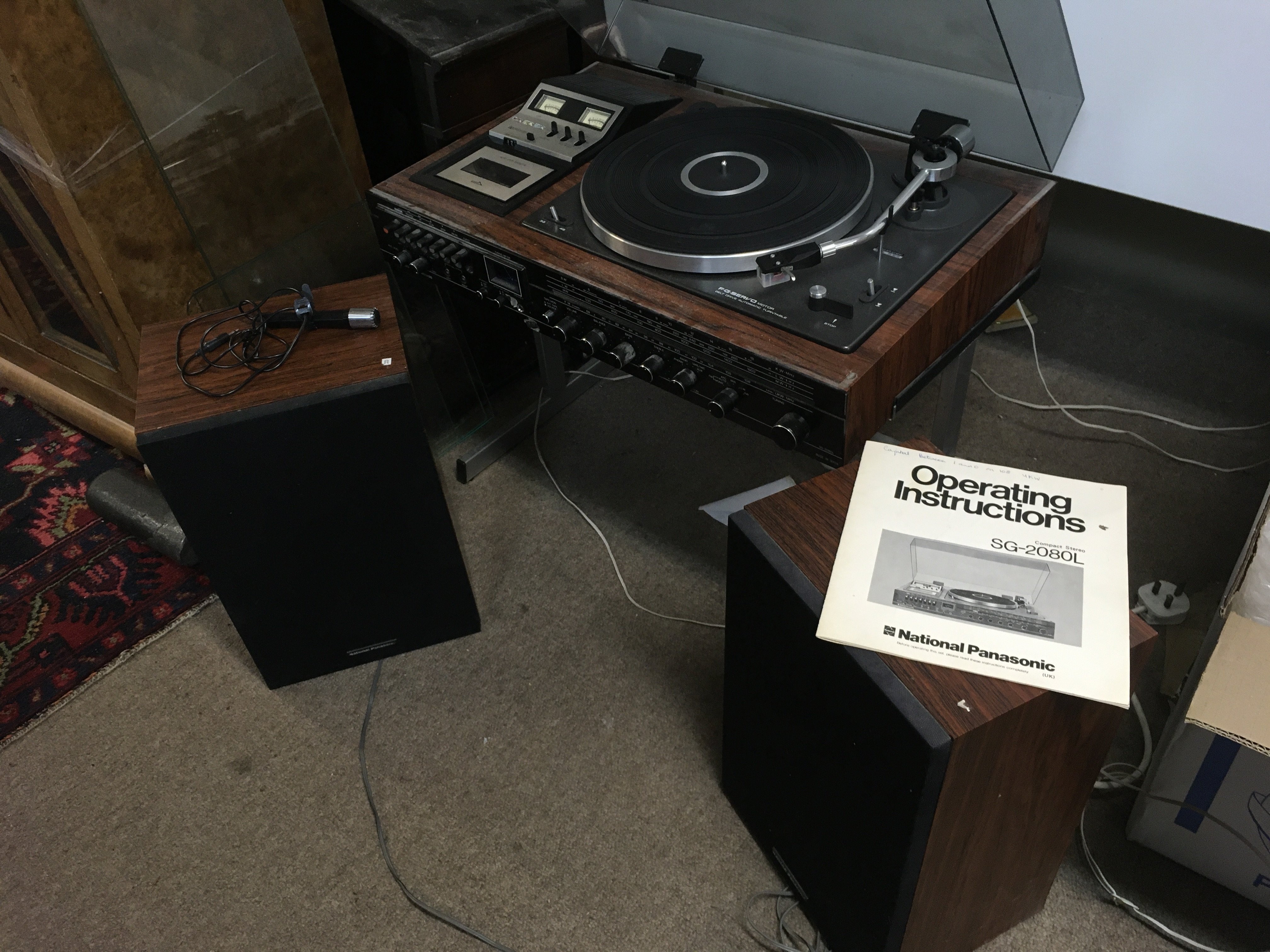 A Panasonic SG-2080L music centre and a pair of Panasonic bookshelf speakers. Comes with operating manual. Shipping category D.