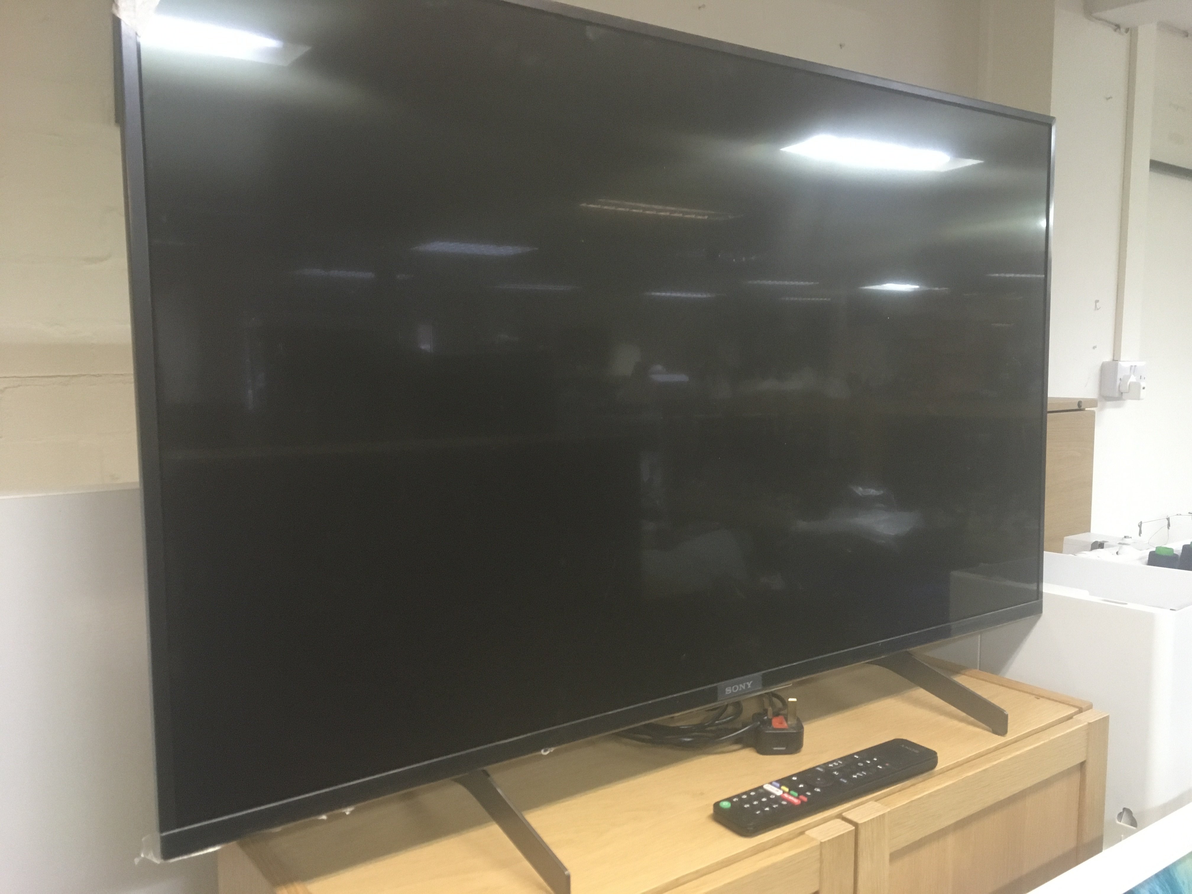 A Sony TV model no KD43XH8505 with remote 43 inches
