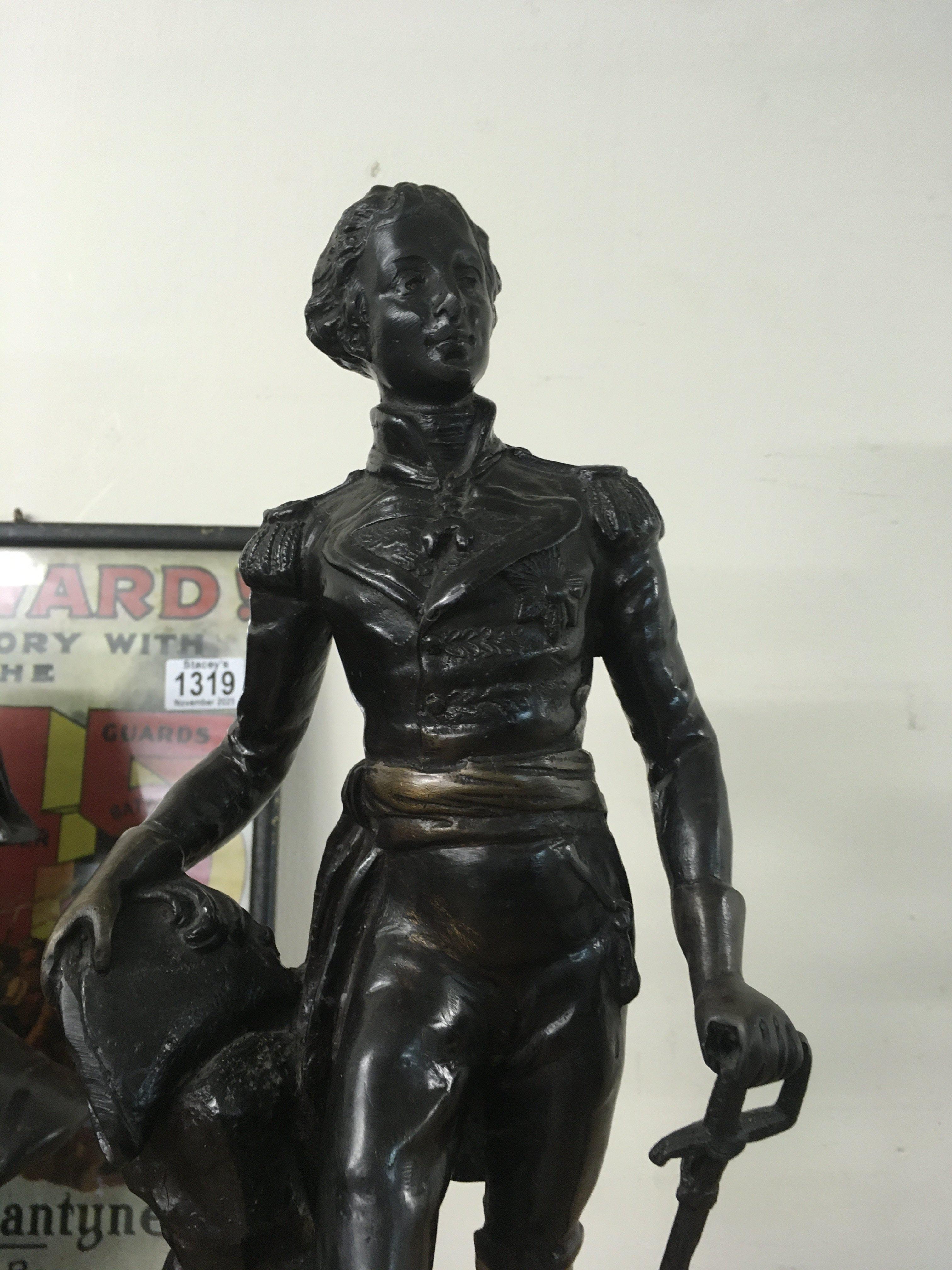 A bronzed figure in the form of Wellington on a marble base .44 cm- NO RESERVE