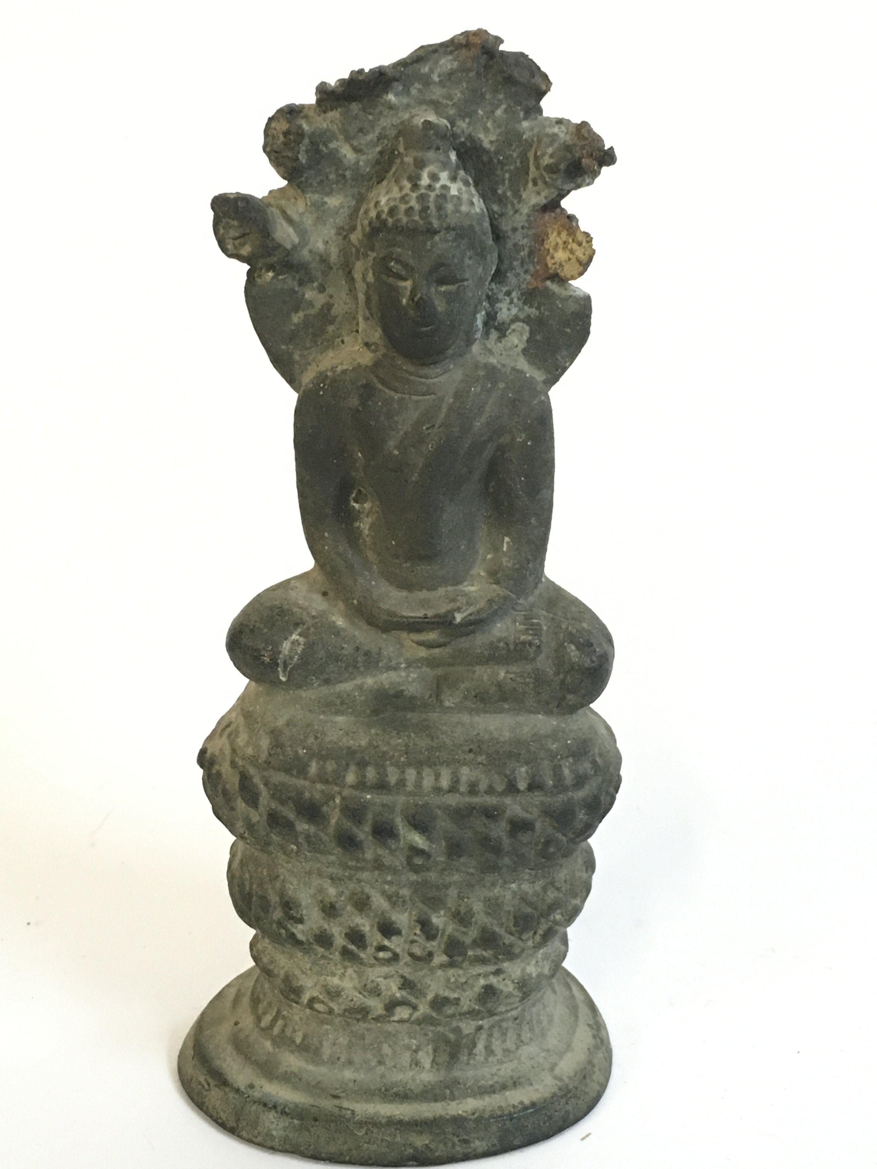 A Thai Seated heavy bronze Naga Buddha . 14cm tall. Postage category A
