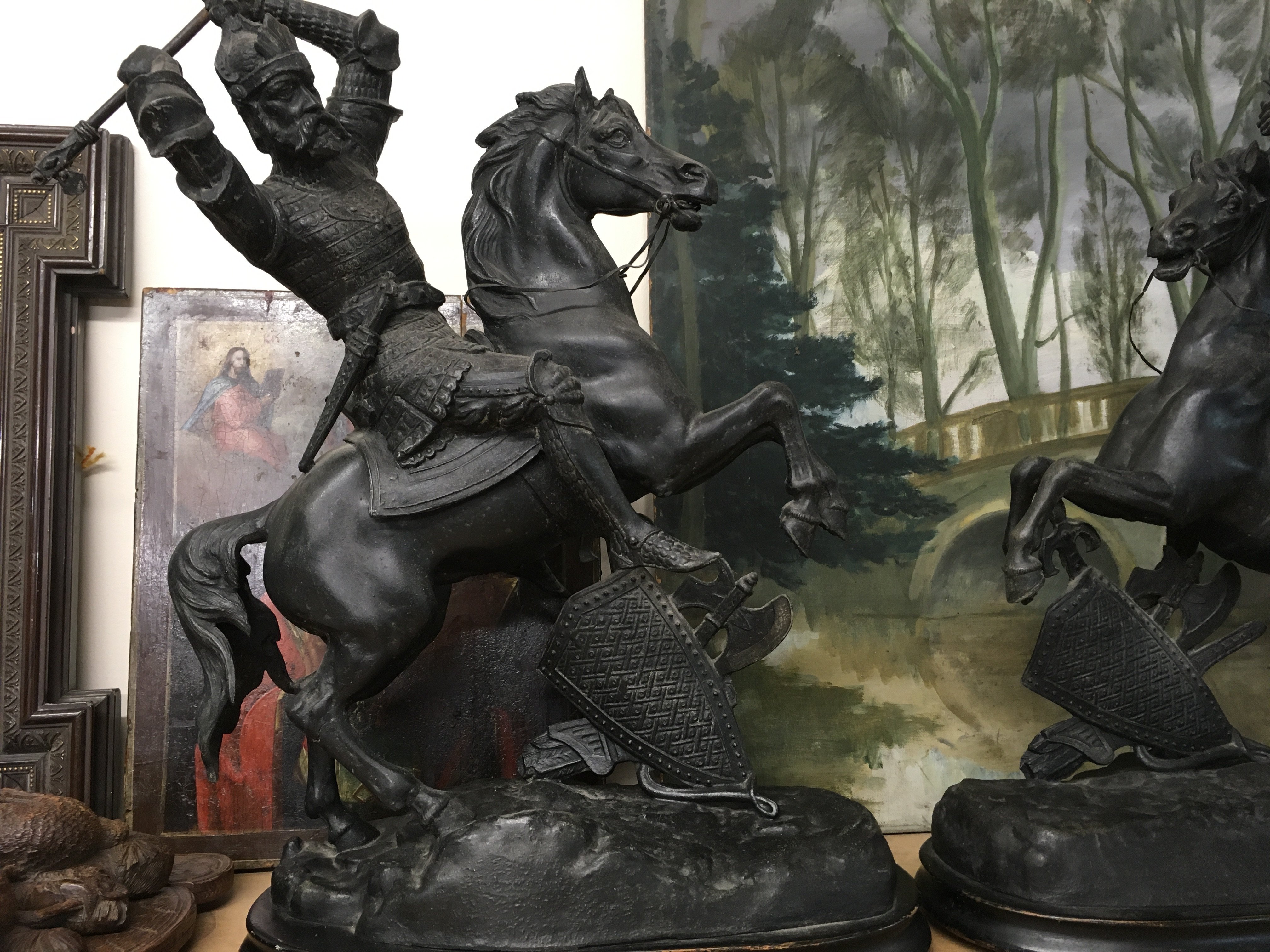 A pair of spelter figures in the form of warriors on rearing horses. 45 cm