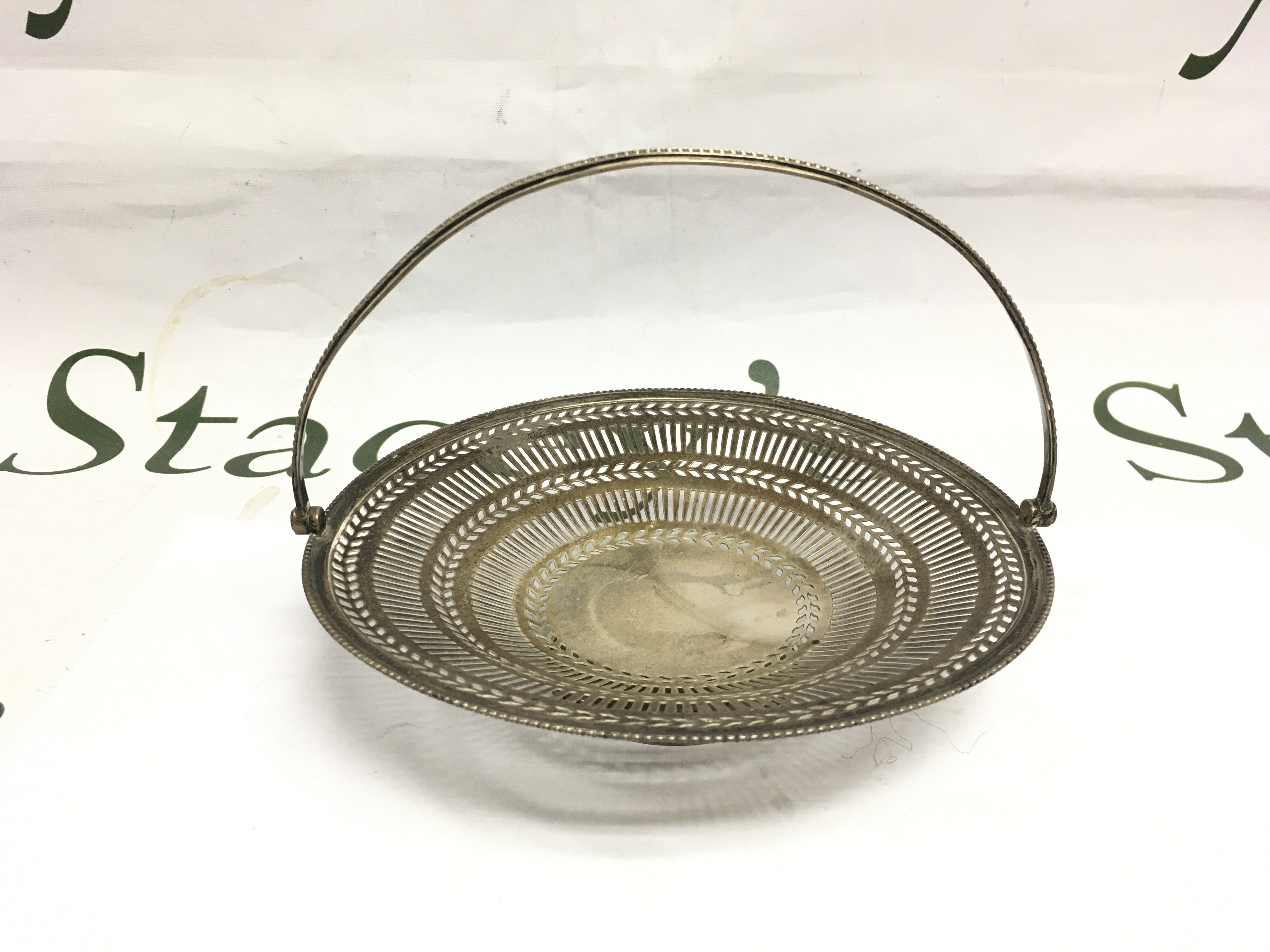 A silver piercework basket, approx 121g. Shipping category B.