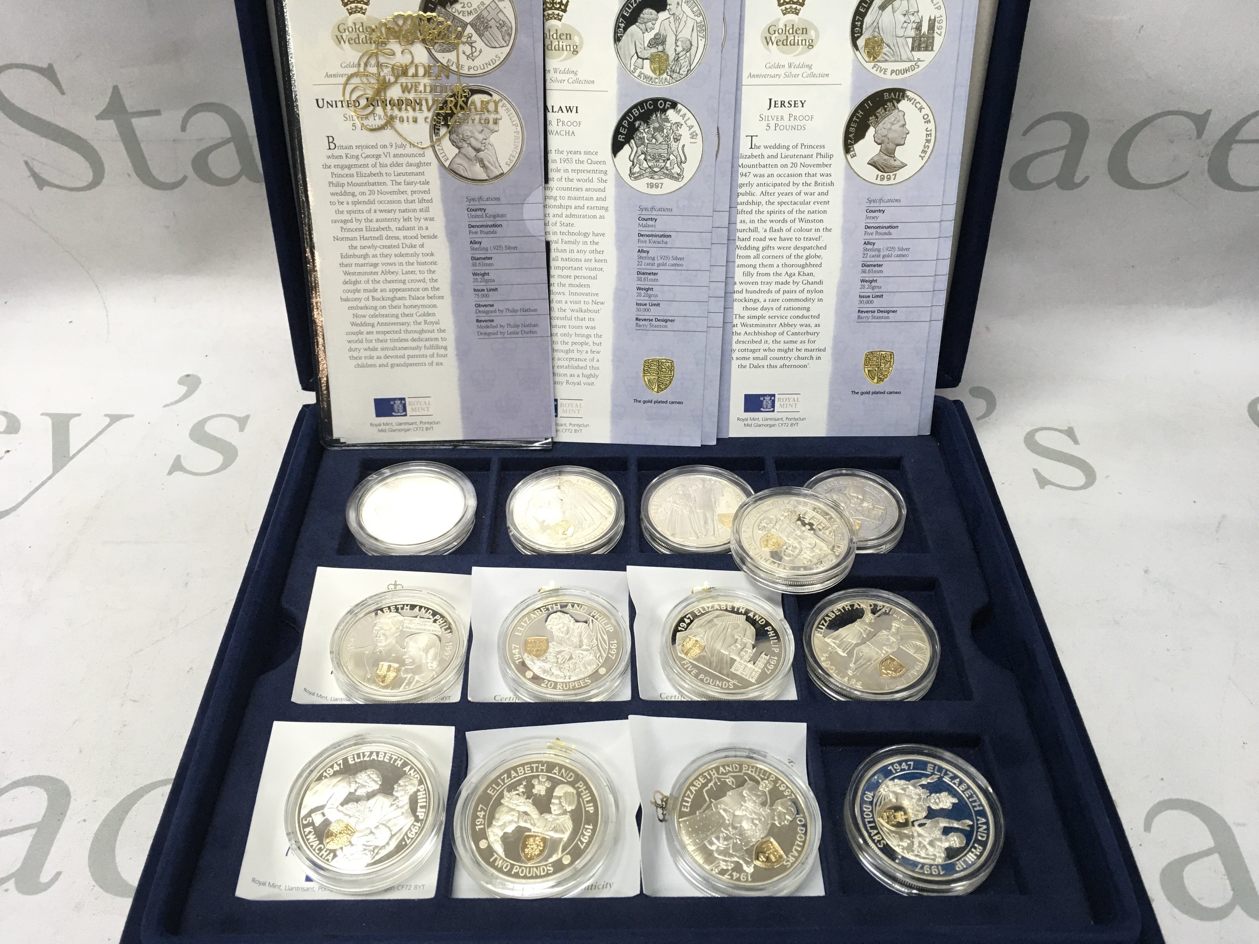 A collection of sterling silver proof coins commemorating the golden wedding anniversary. Postage B