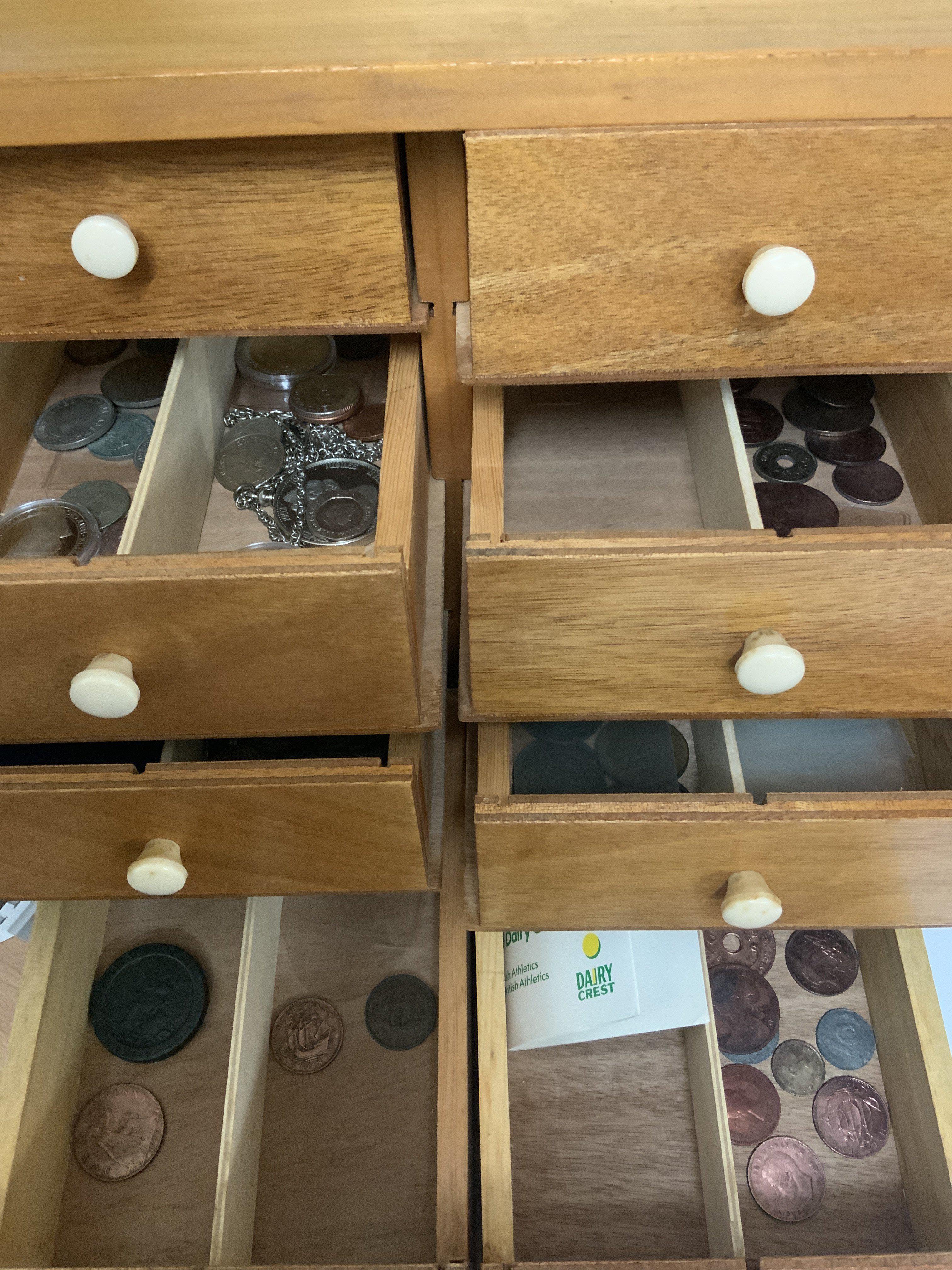 A small cabinet of mixed British coinage