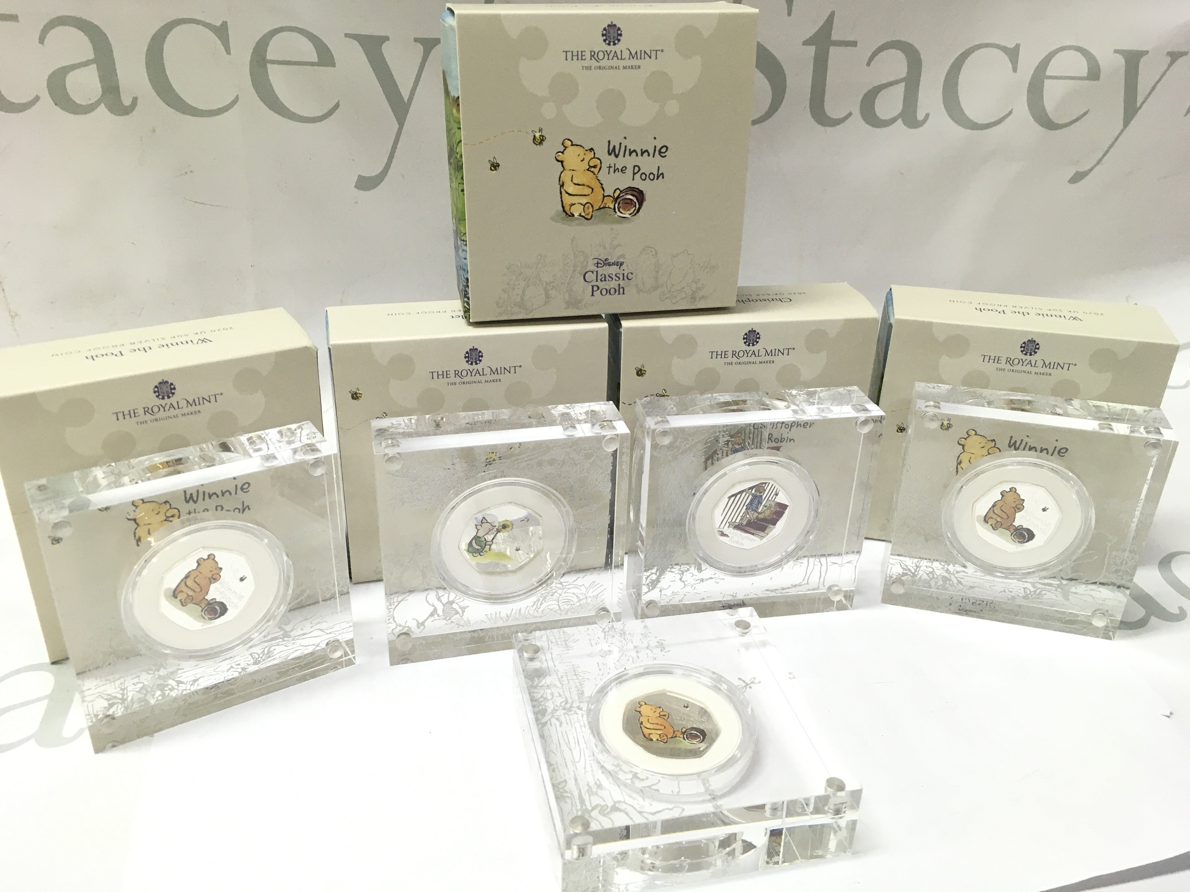 WITHDRAWN Five cased Winnie the Pooh 2020 silver proof 50p coins .