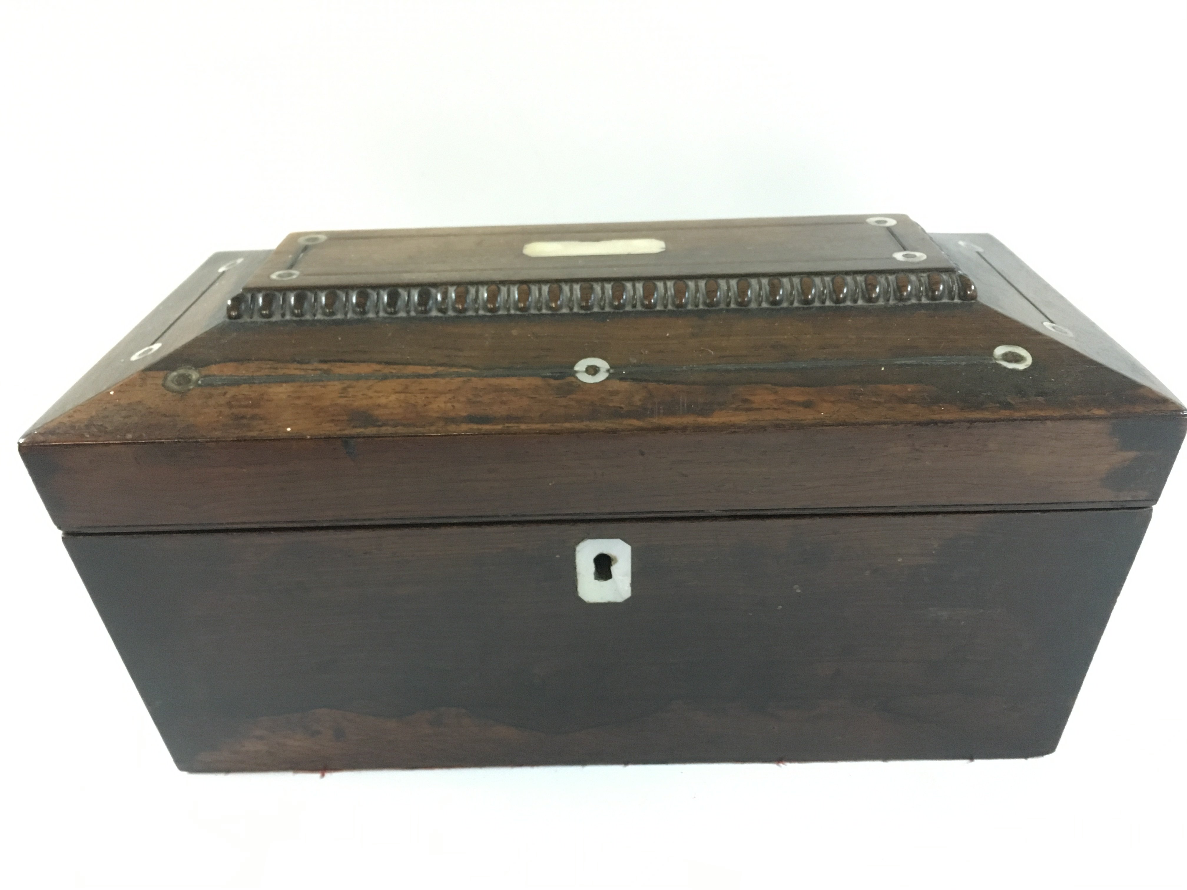 A rosewood tea caddy 29cm wide 16cm tall and a walnut glove box.