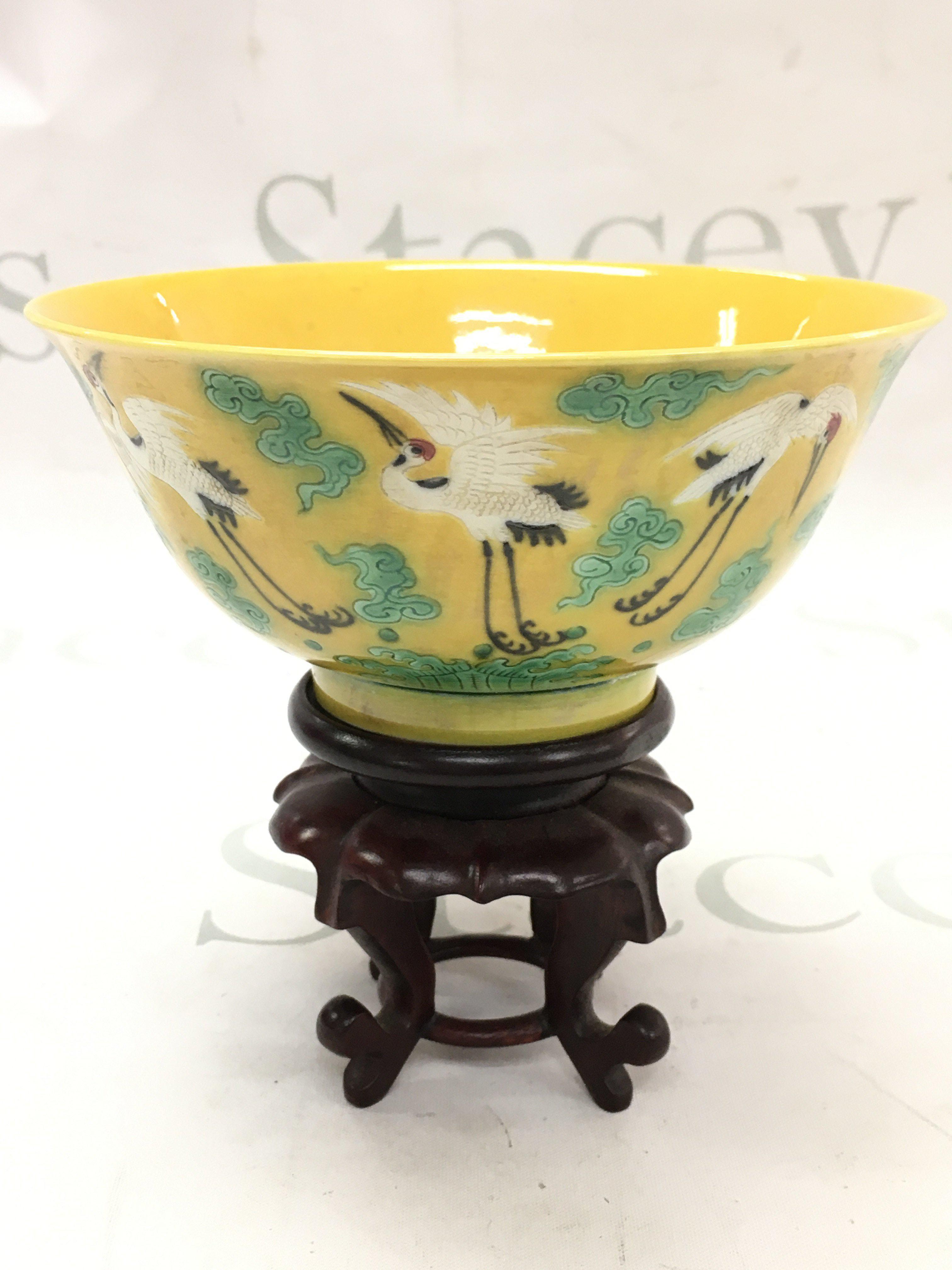 A Chinese yellow glaze dish with crane design, six character to base. 15cm wide ,7cm tall. This lot cannot be posted