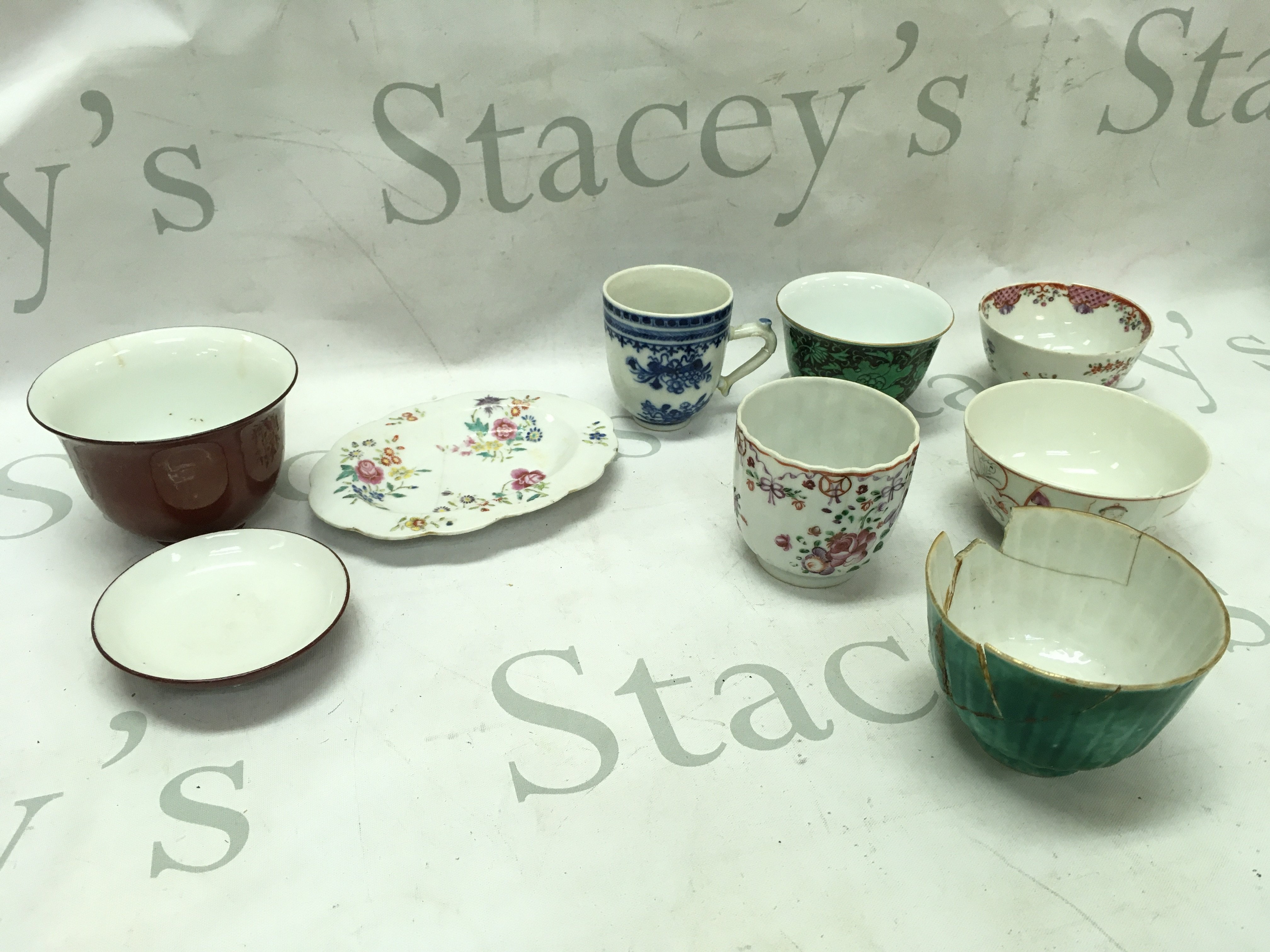 A Collection of Chinese bowls and teacups . Some damage. This lot cannot be posted