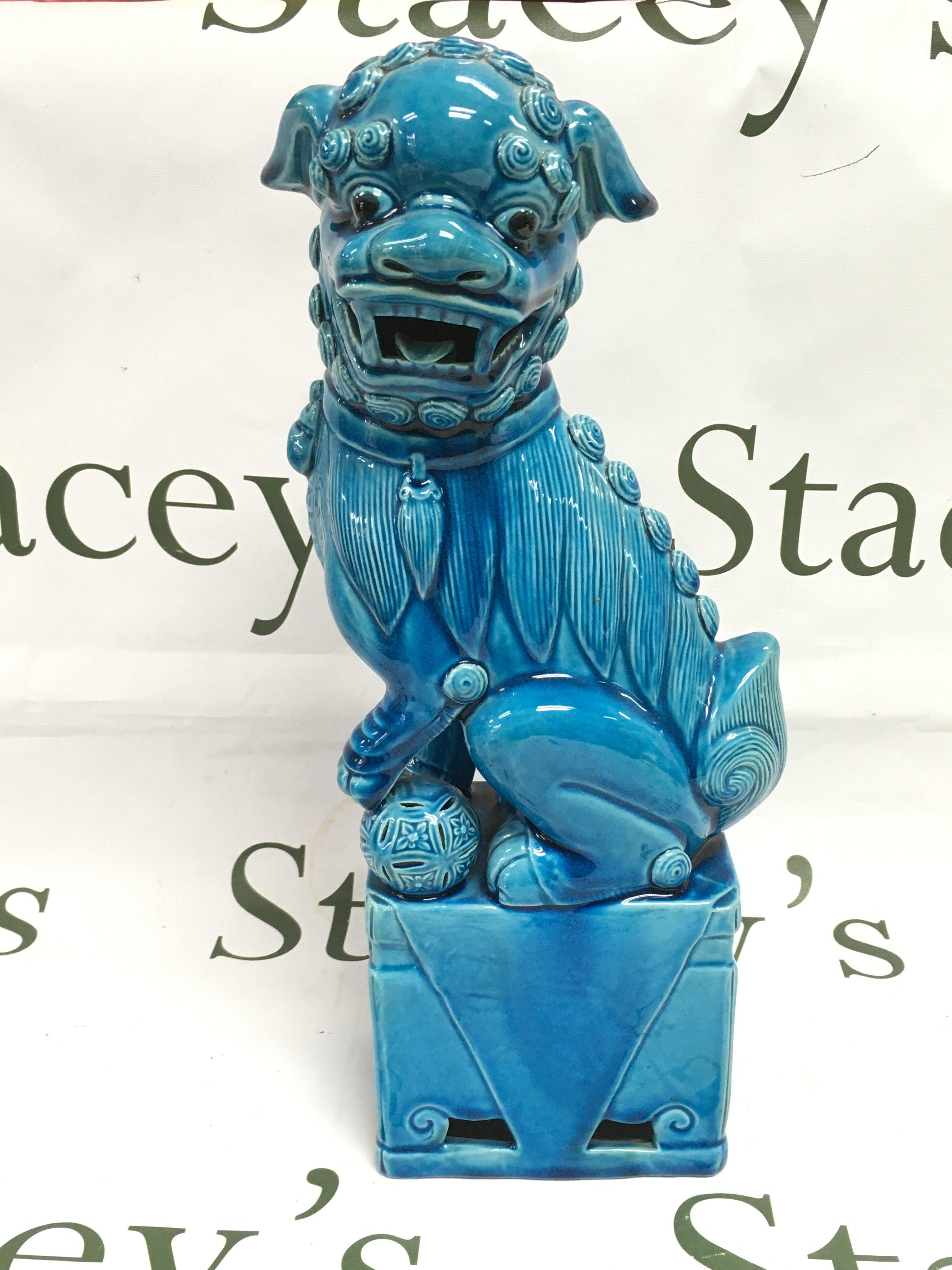 A Chinese Fu dog, approx height 35cm. Shipping category D.