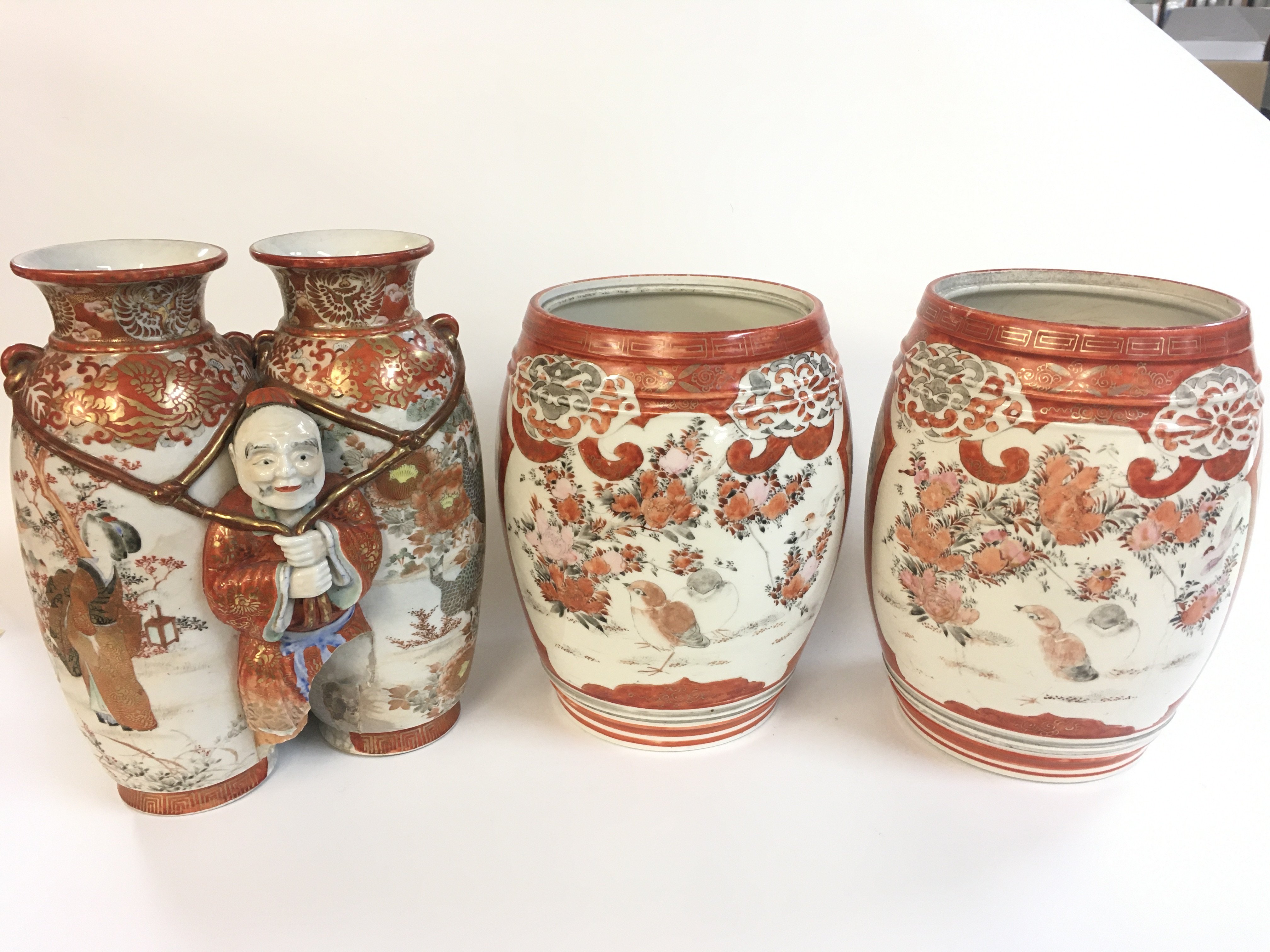 Japanese Kutani vases. Damage as seen. 26 and 23cm tall . This lot cannot be posted