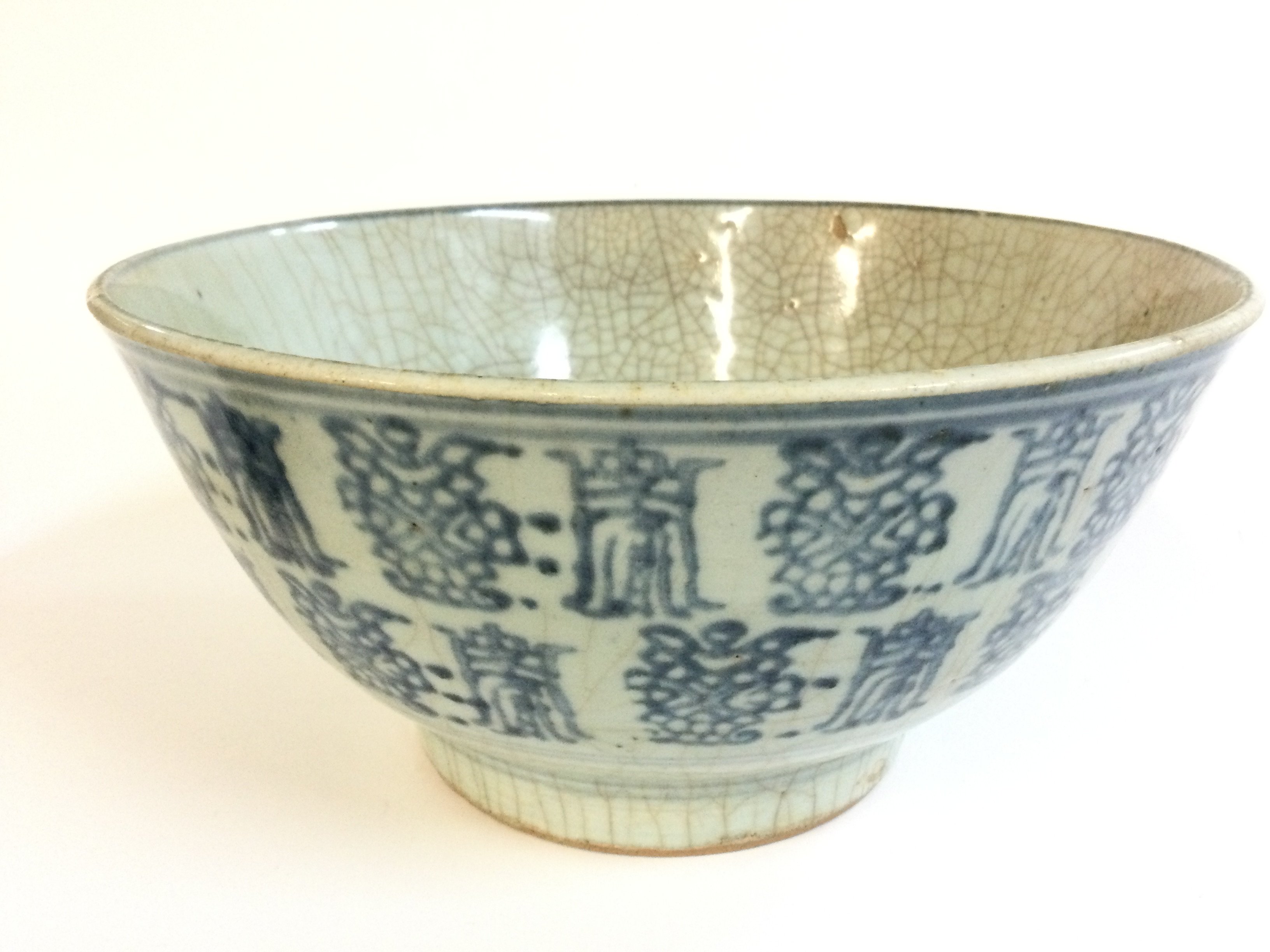A large Chinese Ming Dynasty style blue and white porcelain bowl