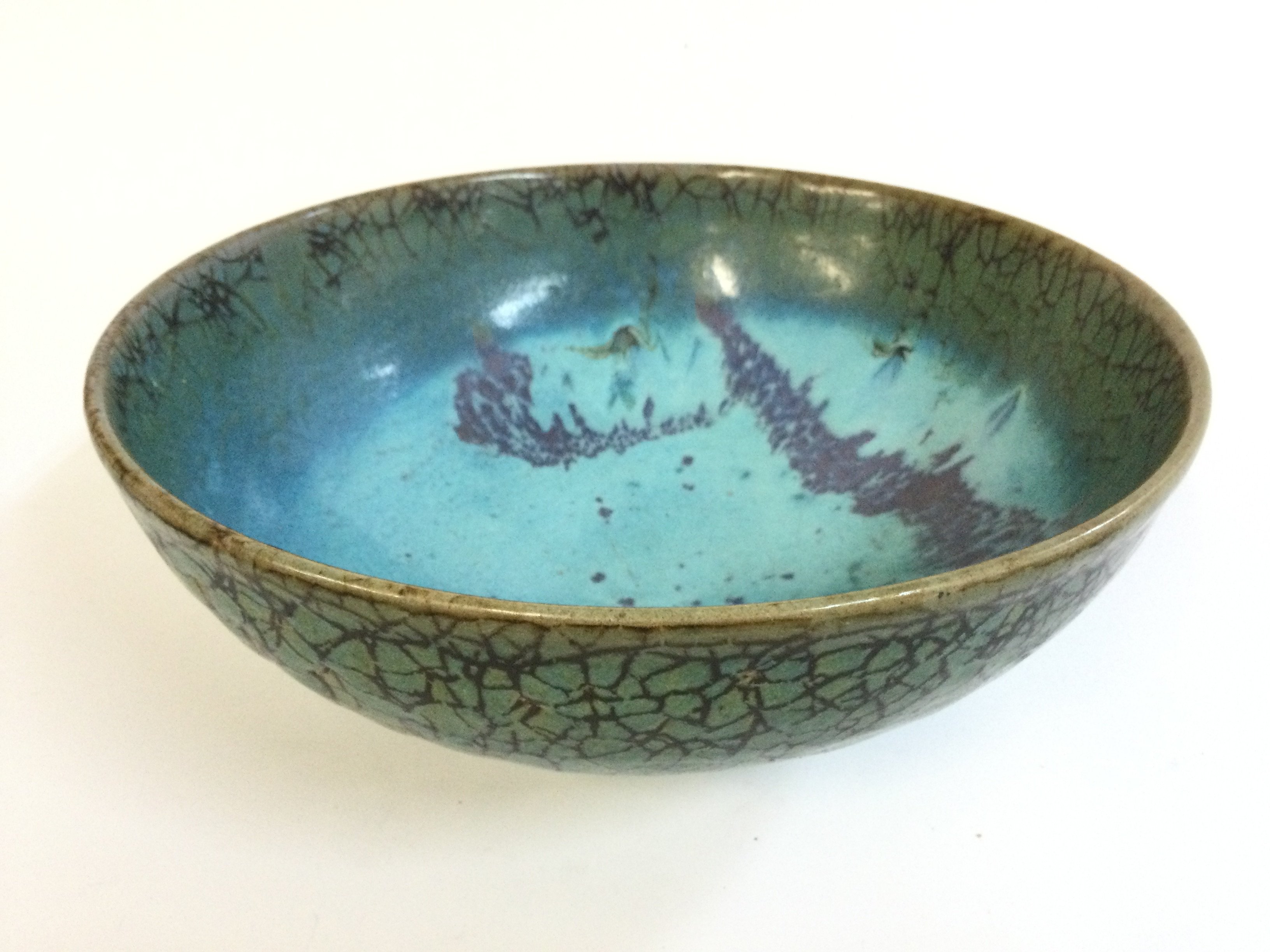 A large Chinese Junyao bowl with purple splashes . 24.5cm wide.