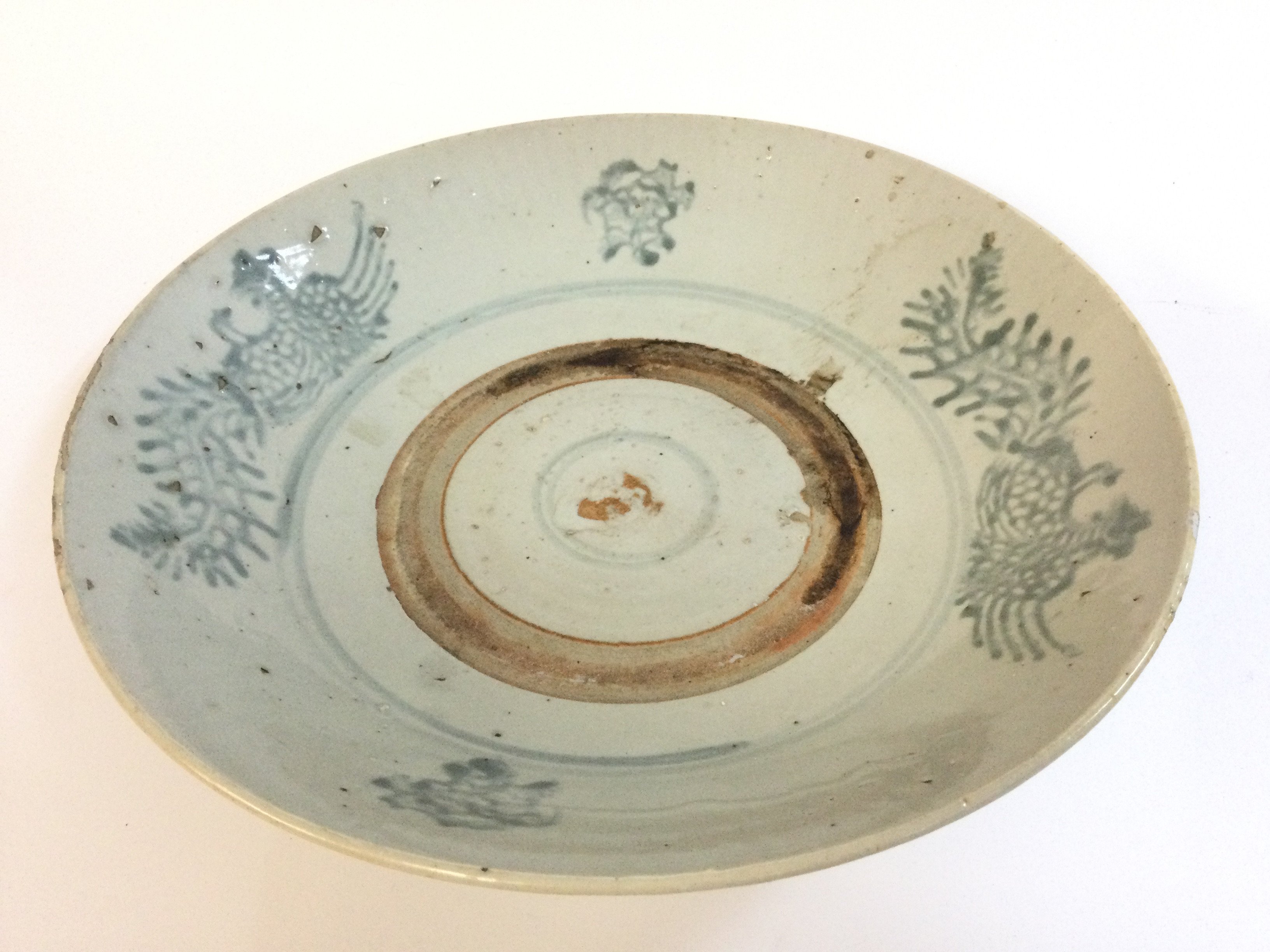 A large Chinese blue and white Ming style porcelain charger , 28cm wide.