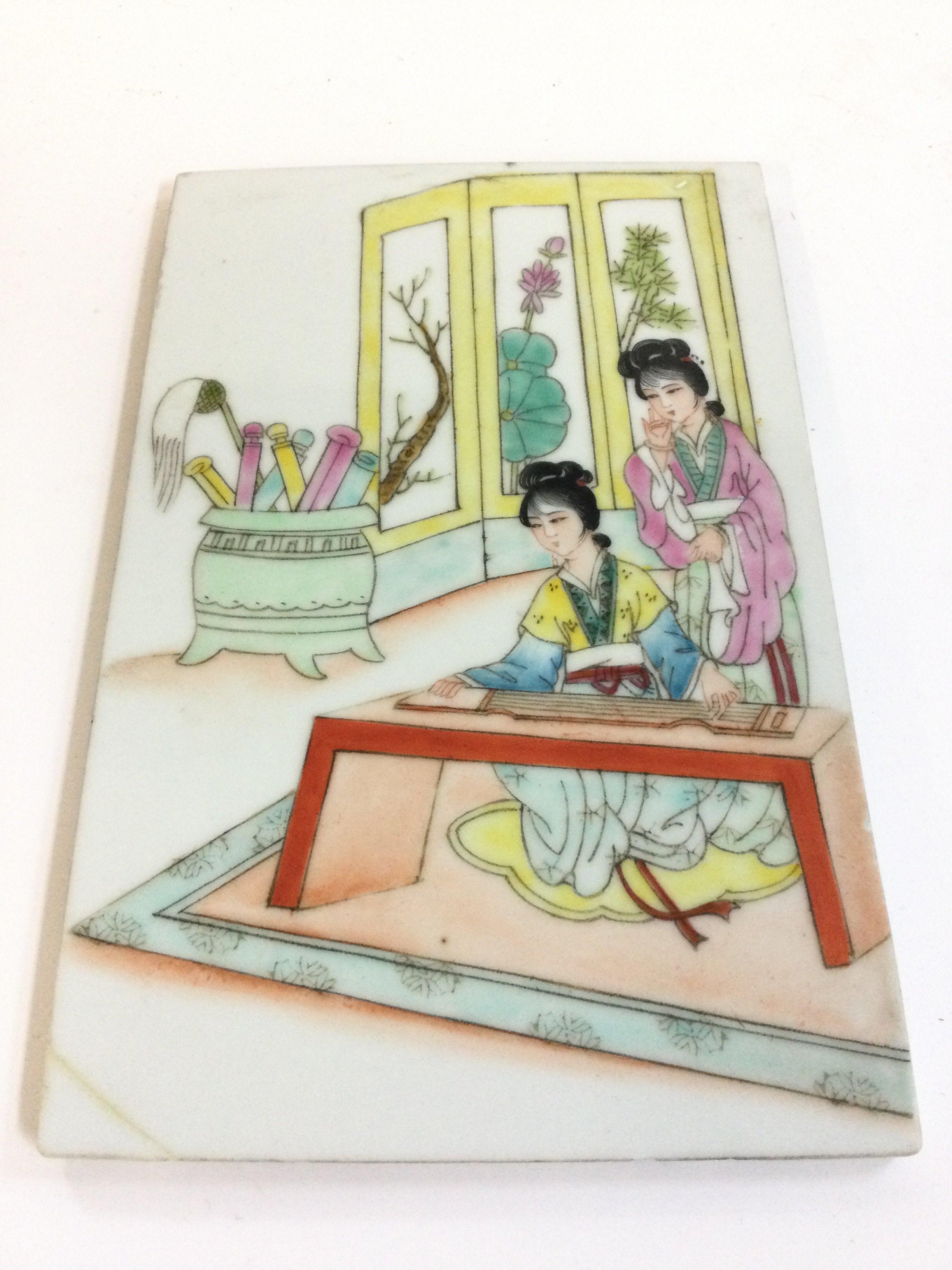 A Chinese Famille Rose porcelain tile , 12cm wide 18.5cm tall.