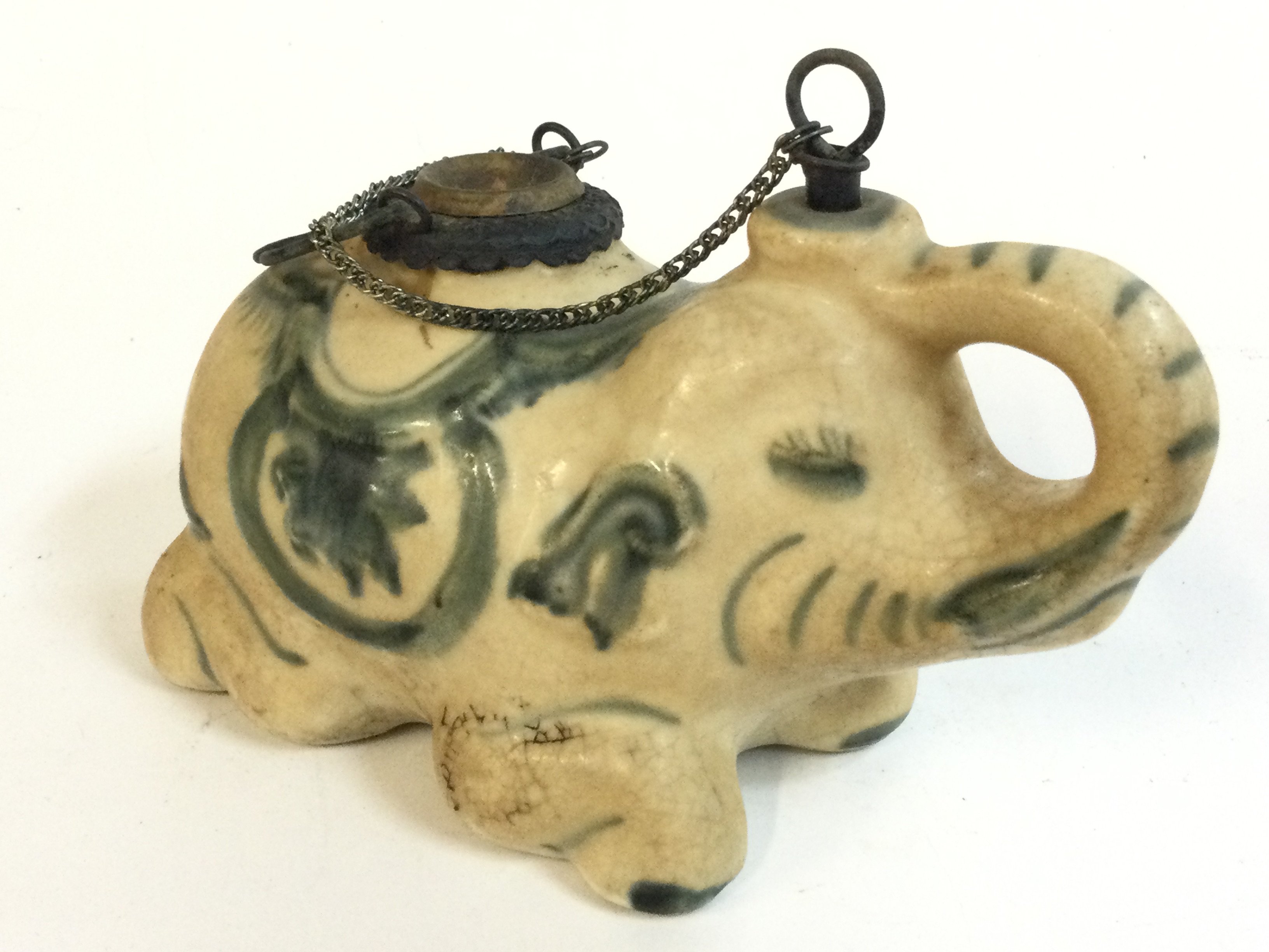 A Chinese porcelain elephant opium smoking pipe 15cm long 10cm tall approximately