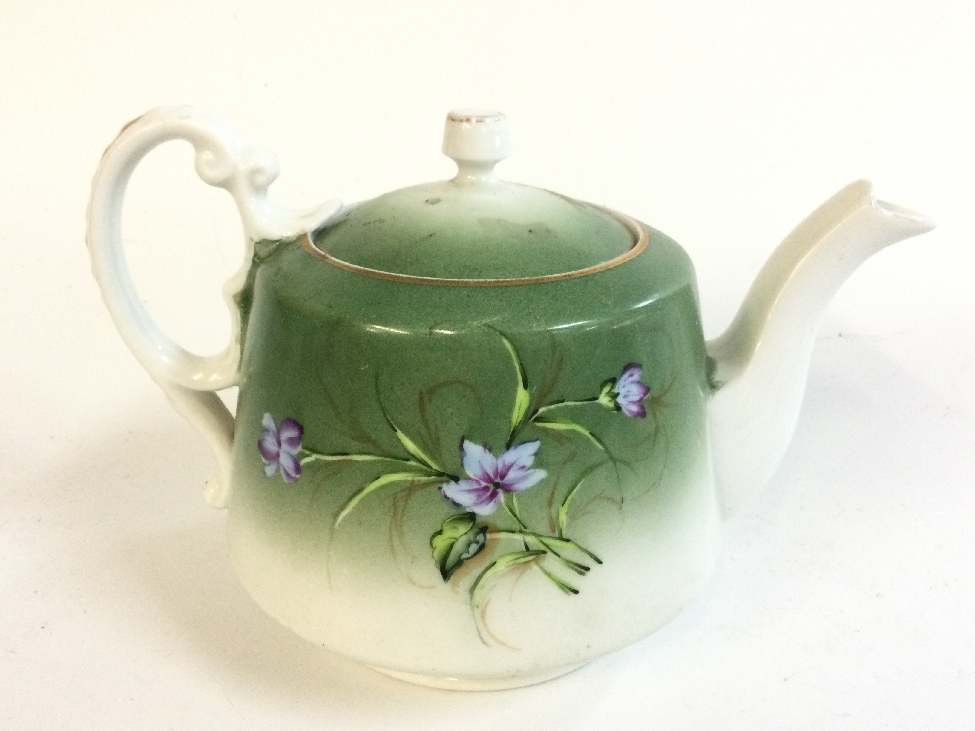 A Russian Gardener Factory teapot , 11cm tall.