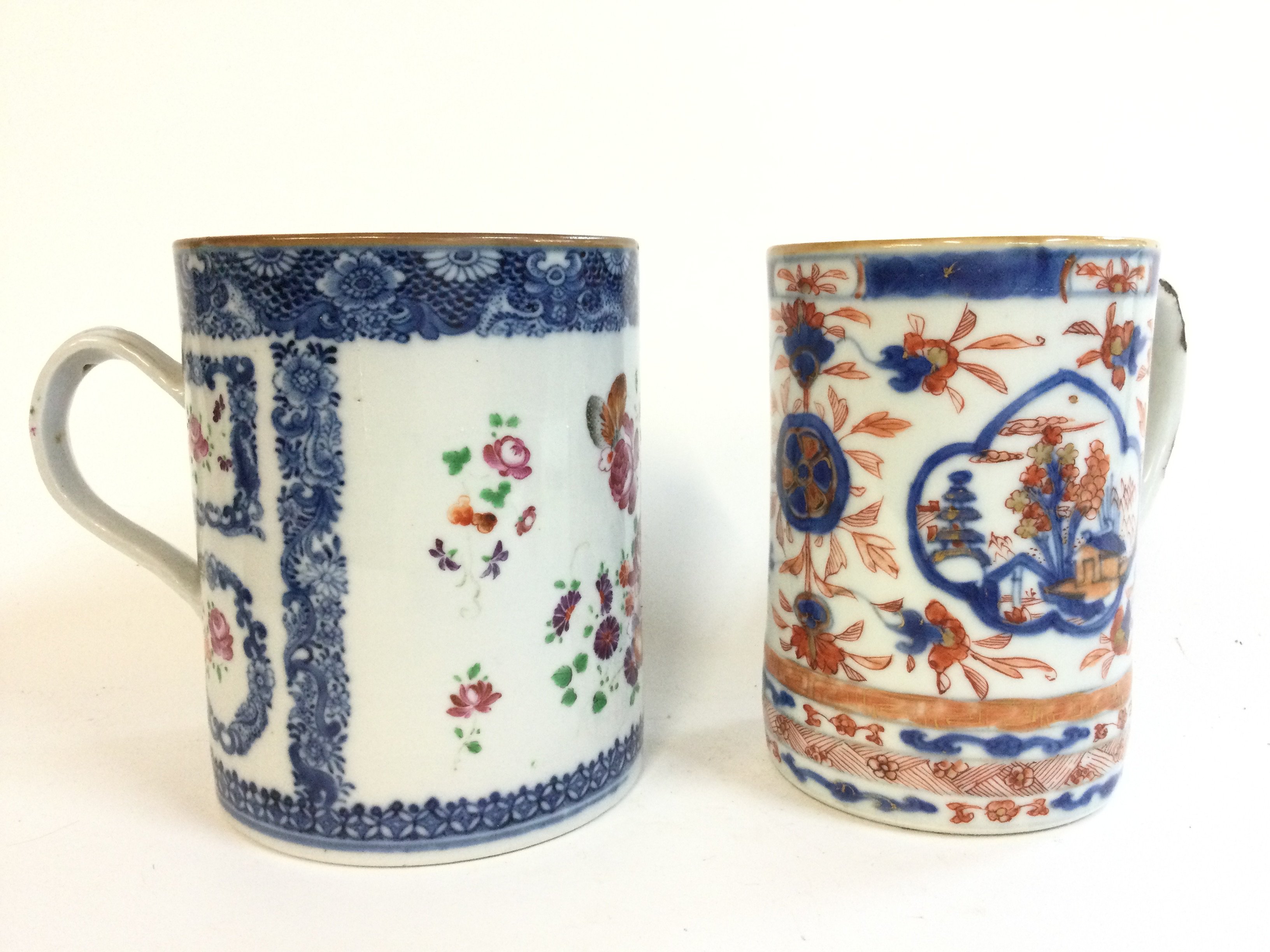 Two Chinese tankards Imari and Famille rose. Both approximately 13cm tall.