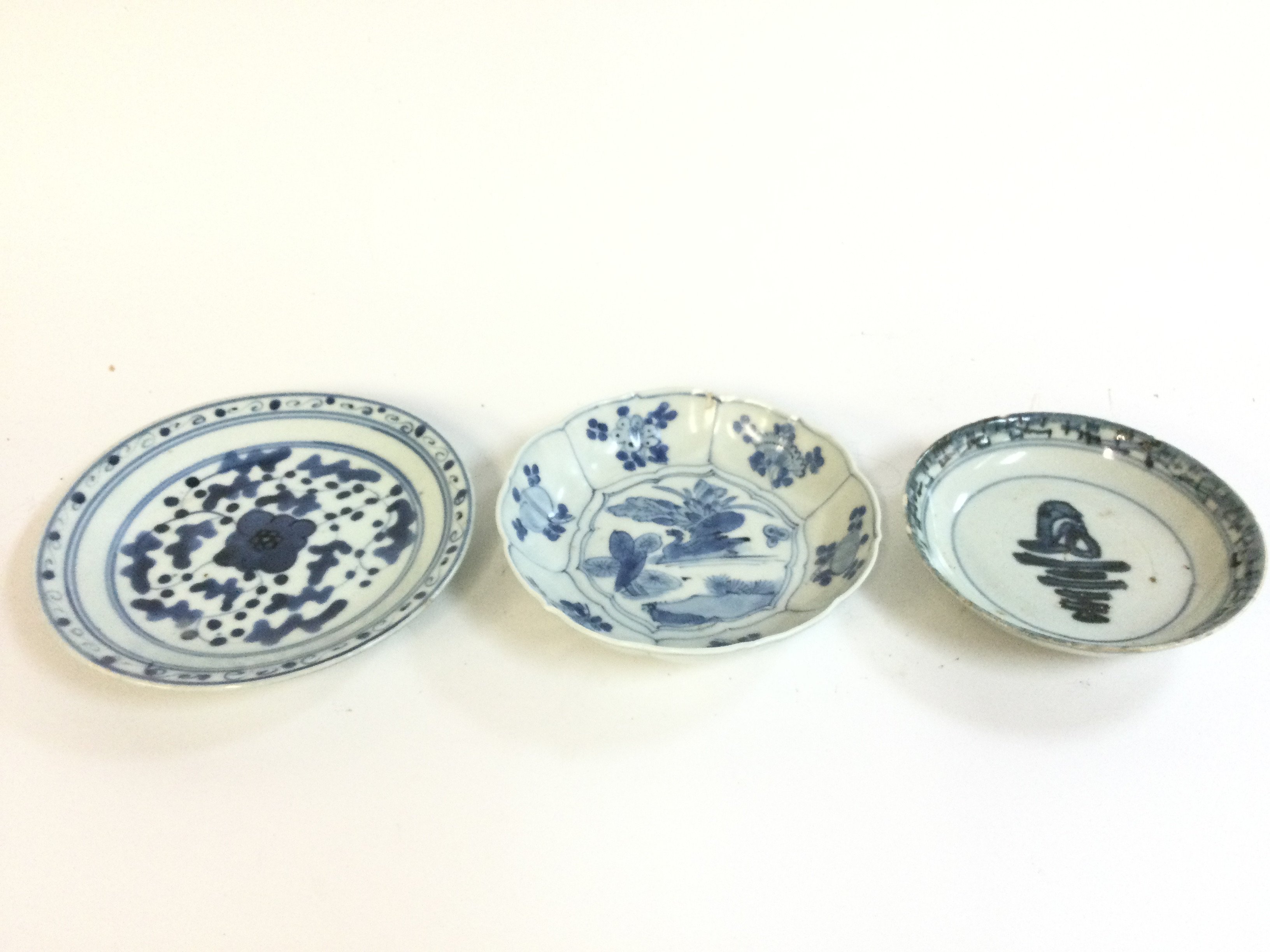 Three Chinese blue and white Ming style dishes . 12 to 15cm wide