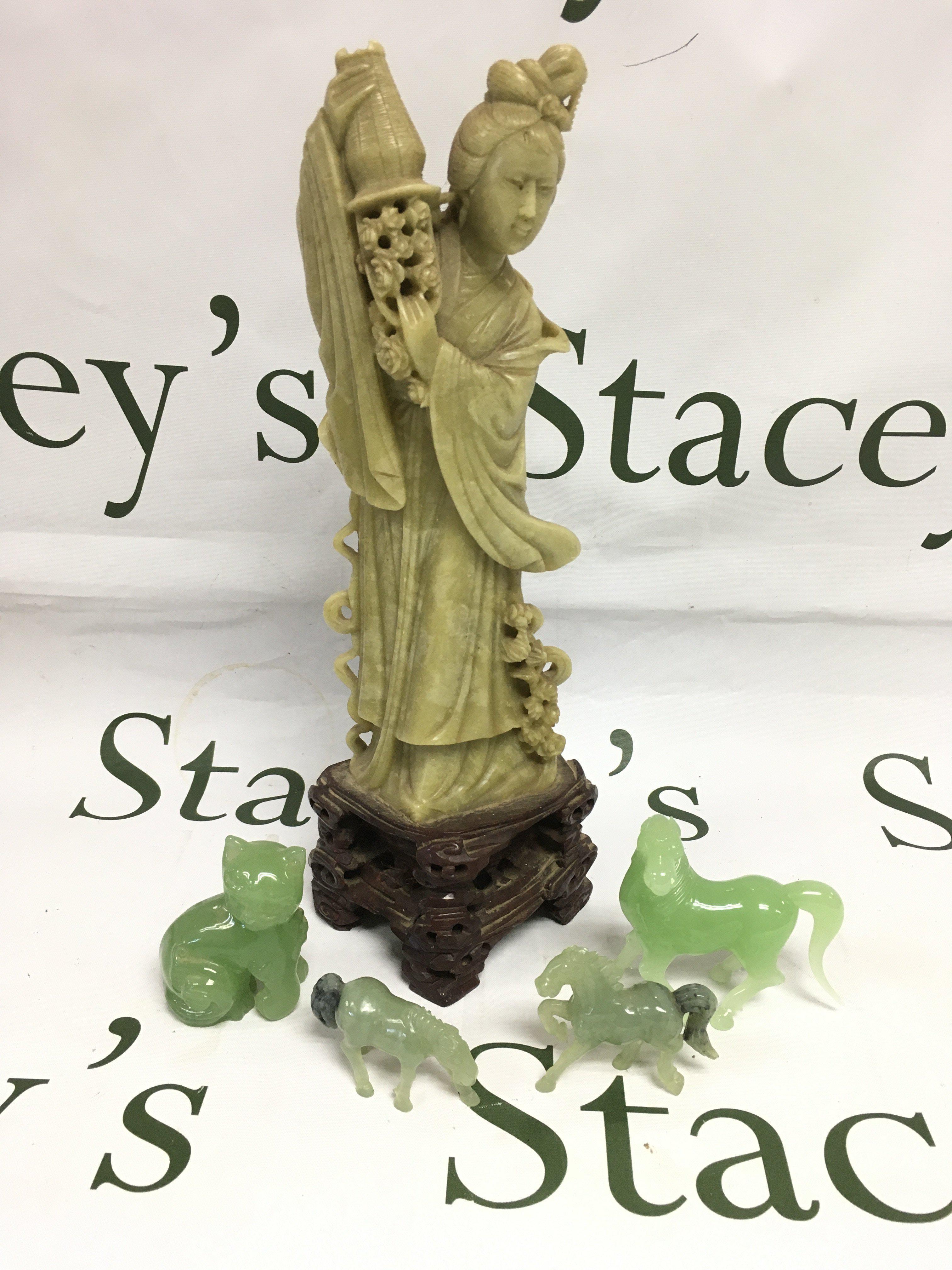 A collection of jadeite and soapstone figures, largest approx 31cm in height. Shipping category D.