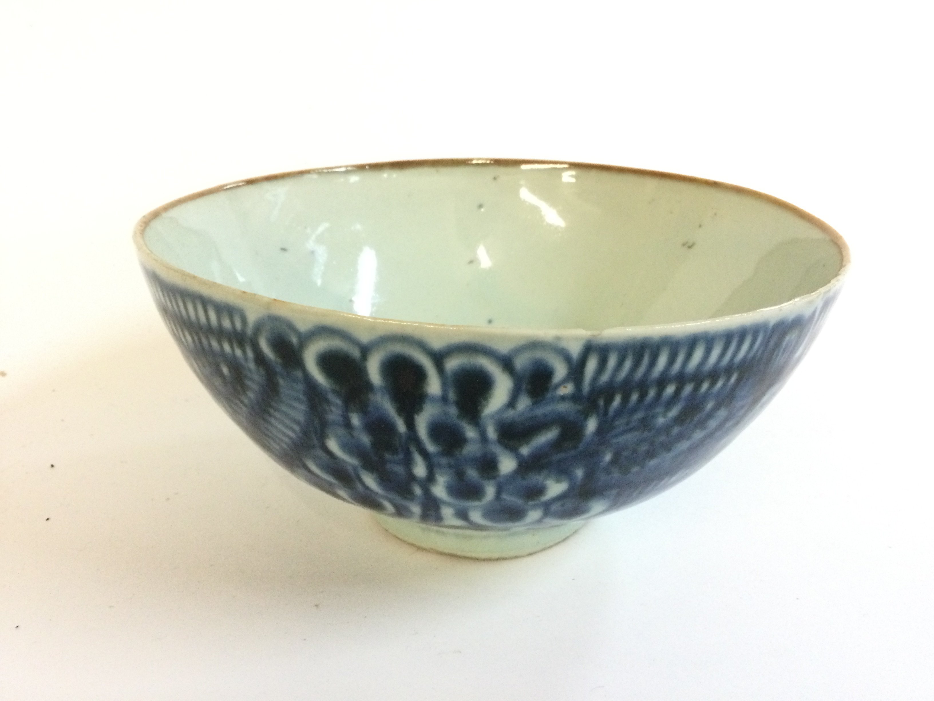 A Chinese Ming style blue and white bowl , 18cm wide. 8cm tall approximately.