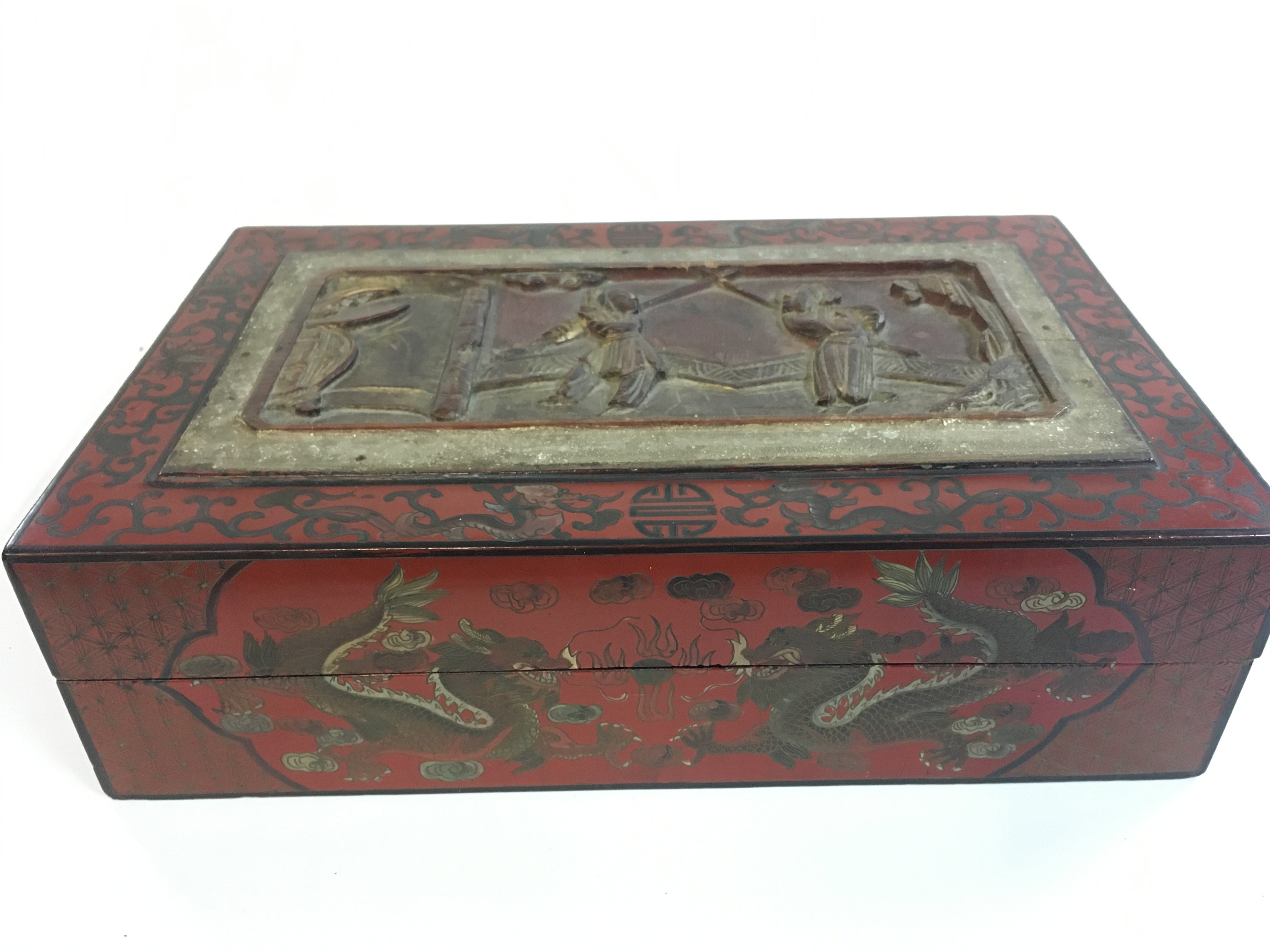 A large antique Chinese red cinnabar box , 35cm wide 10cm tall