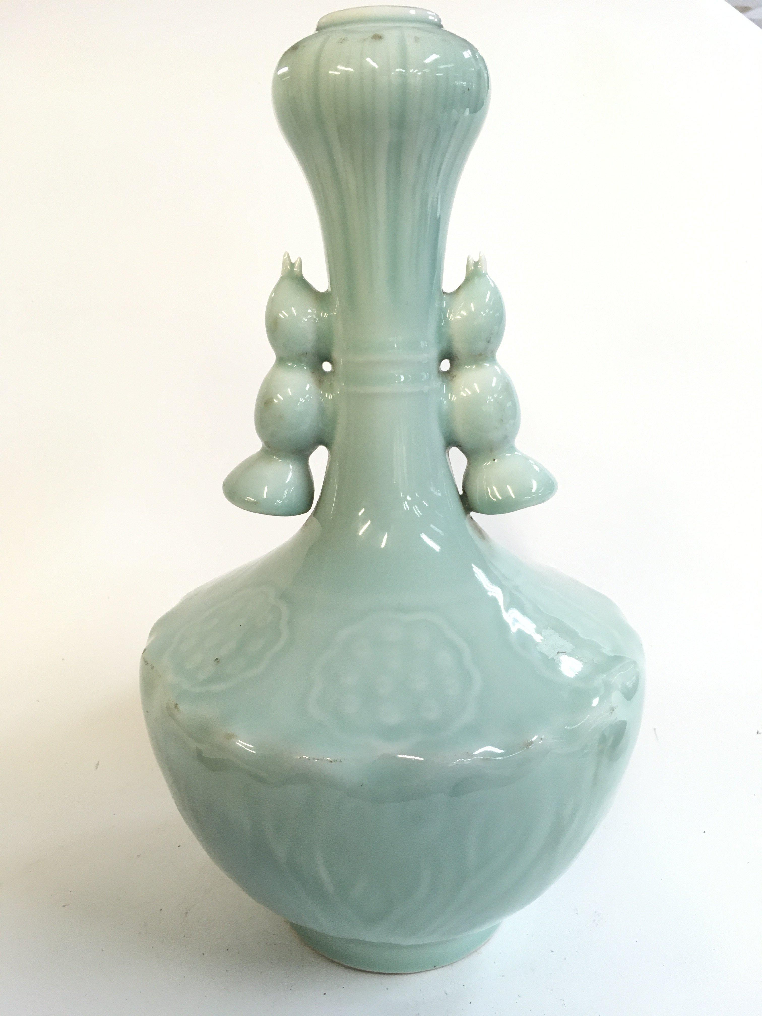A Chinese porcelain cyan glaze lotus root vase with a six character mark at base. 34cm tall.