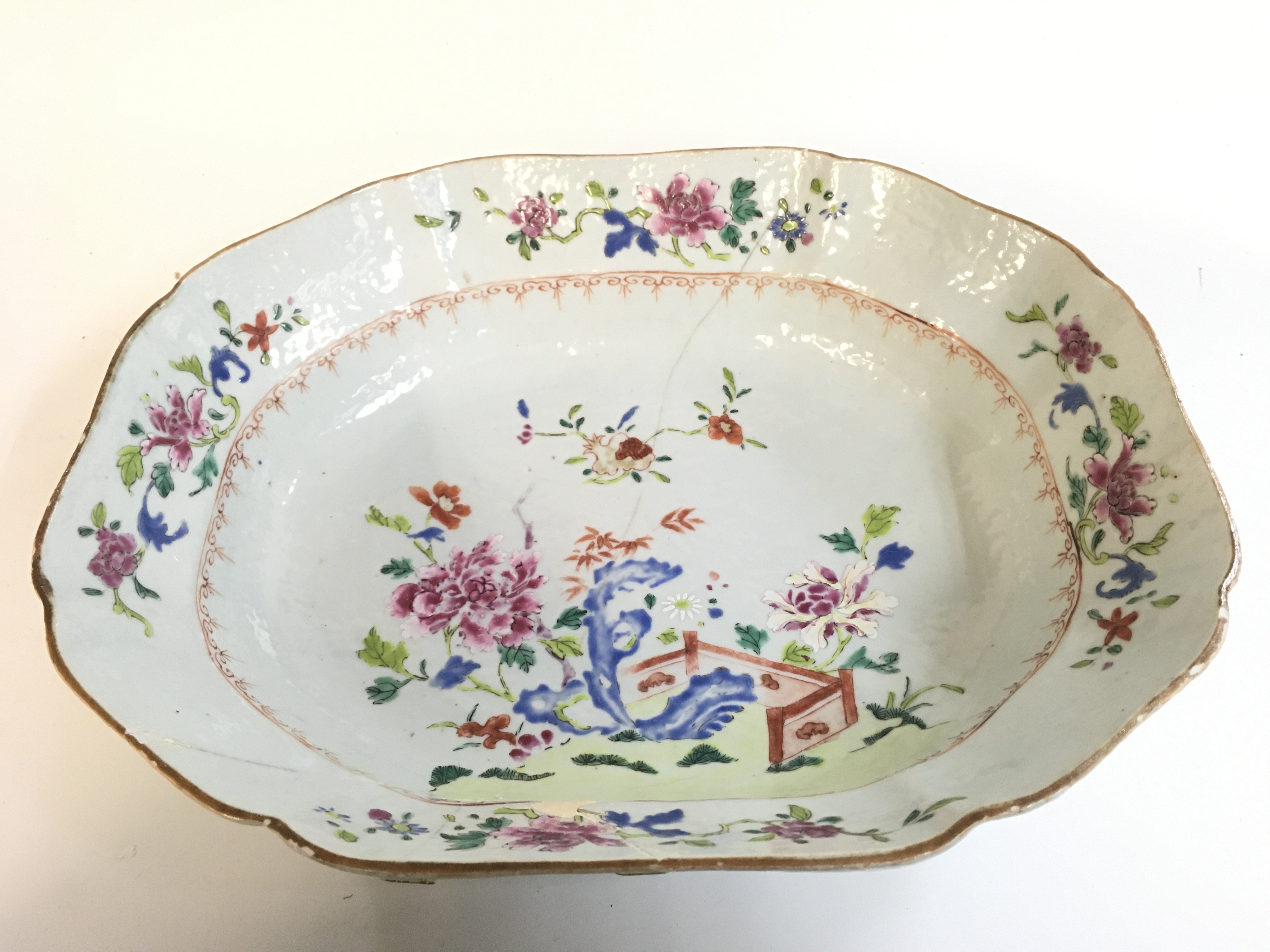 A Chinese bowl with damage large hairline crack and restoration