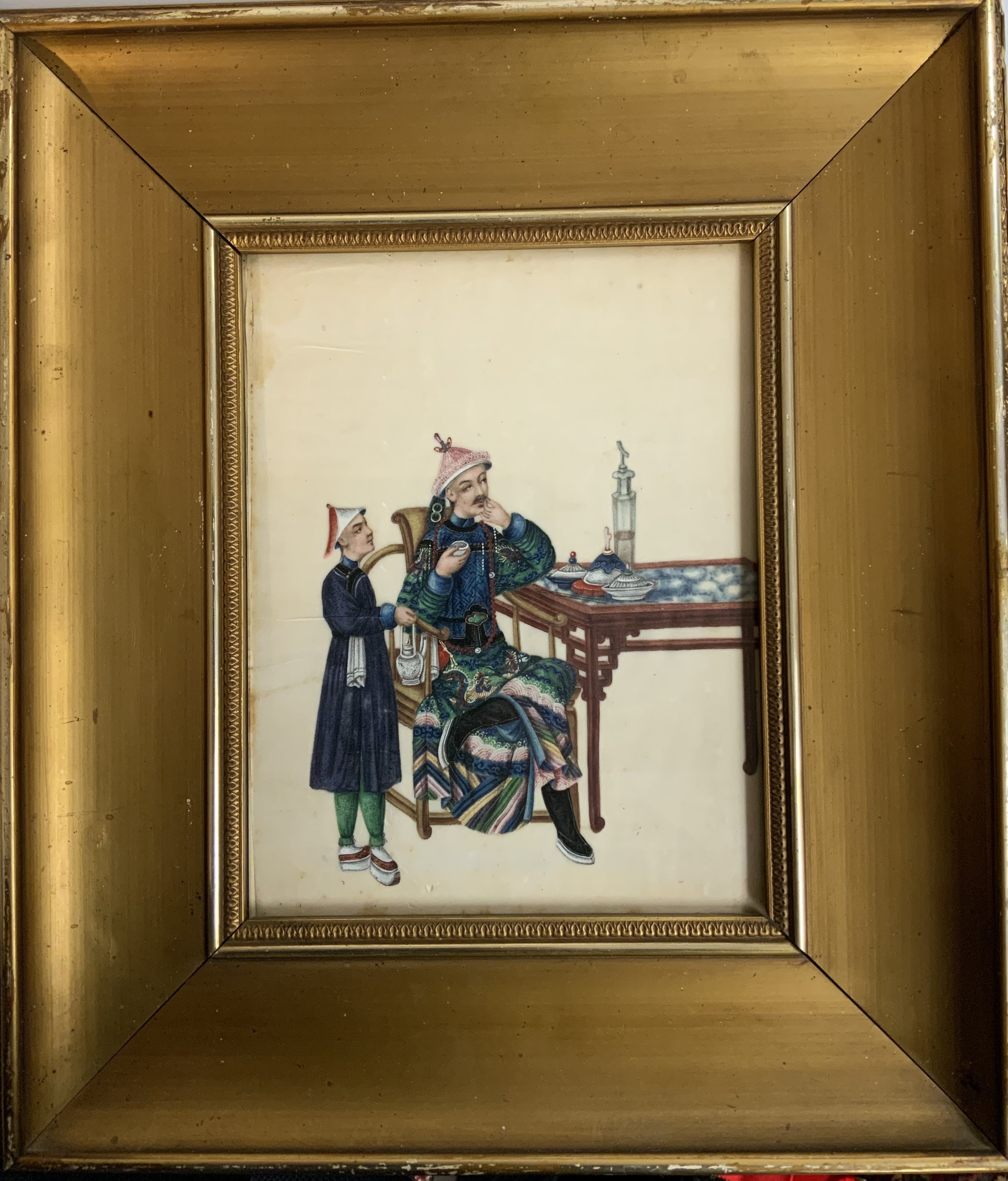 A 19th Century traditional Chinese painting on Pith paper in a gilt wooden frame together with a 19th century Indian painting of a gentleman.
