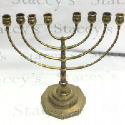 A brass Menorah 41cm tall 38cm wide . Postage category C- NO RESERVE