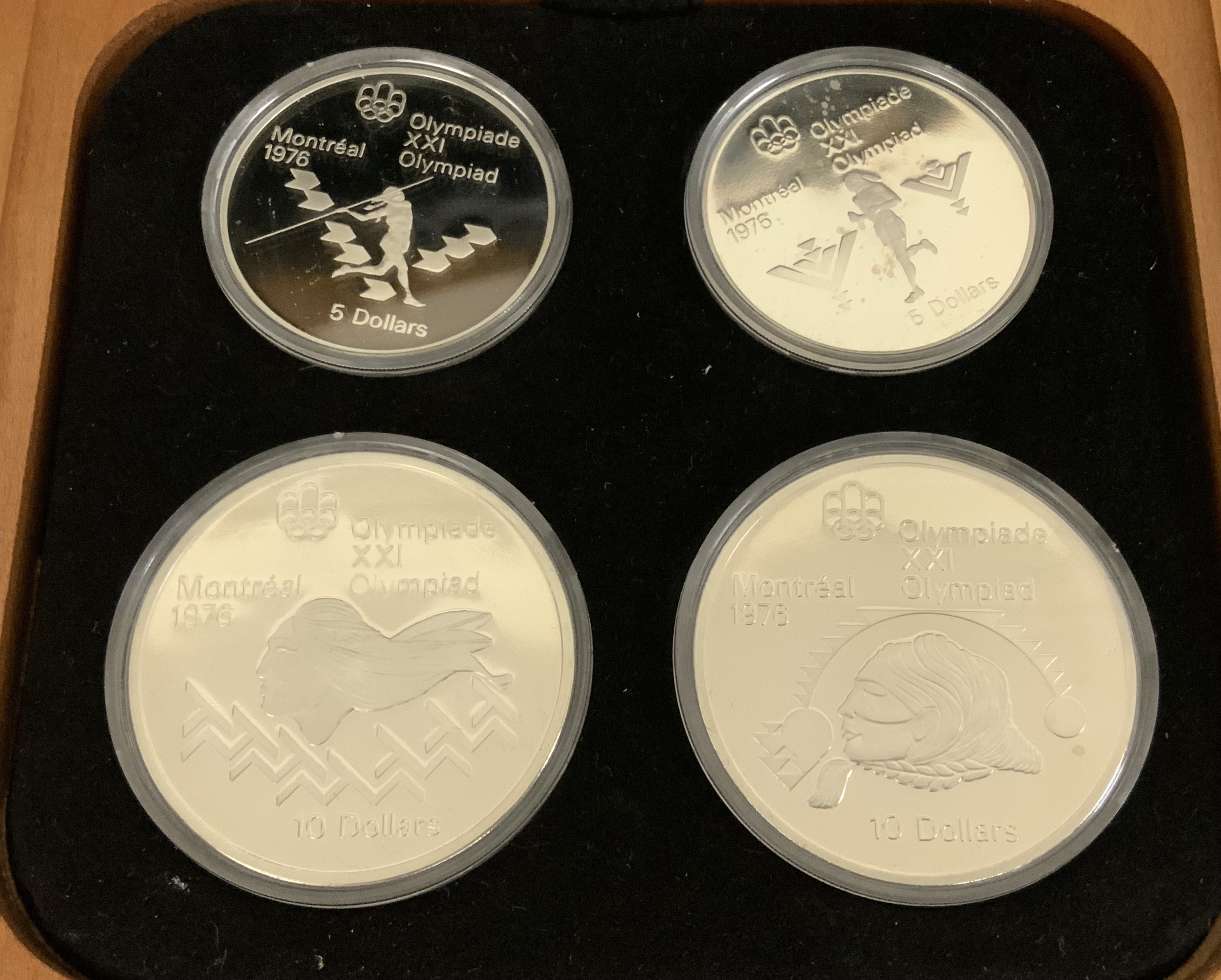 7 sterling silver Olympic coin proof sets, for the 1972 Canada Olympics. (A)
