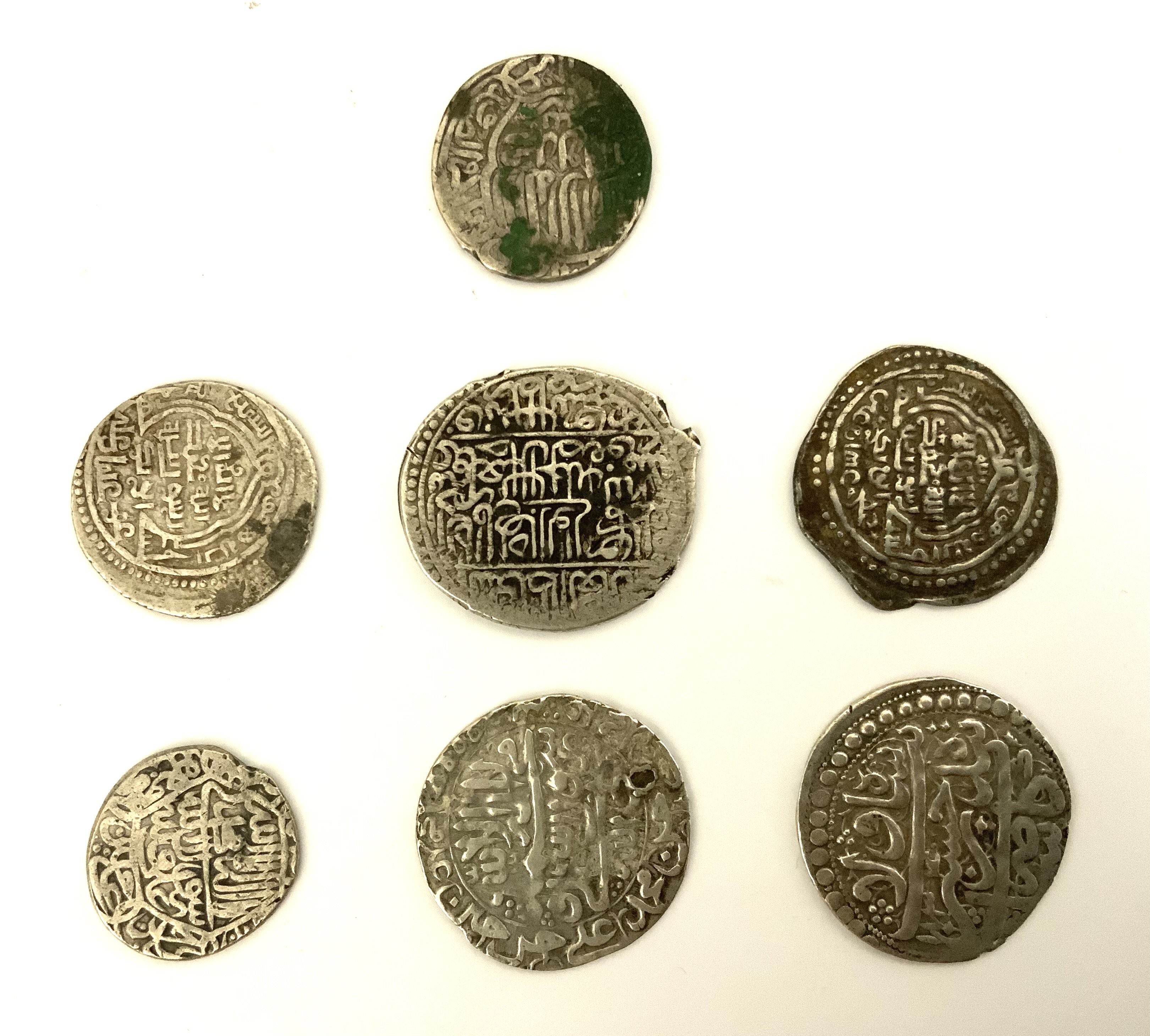 A small collection of early Rupees. (A)