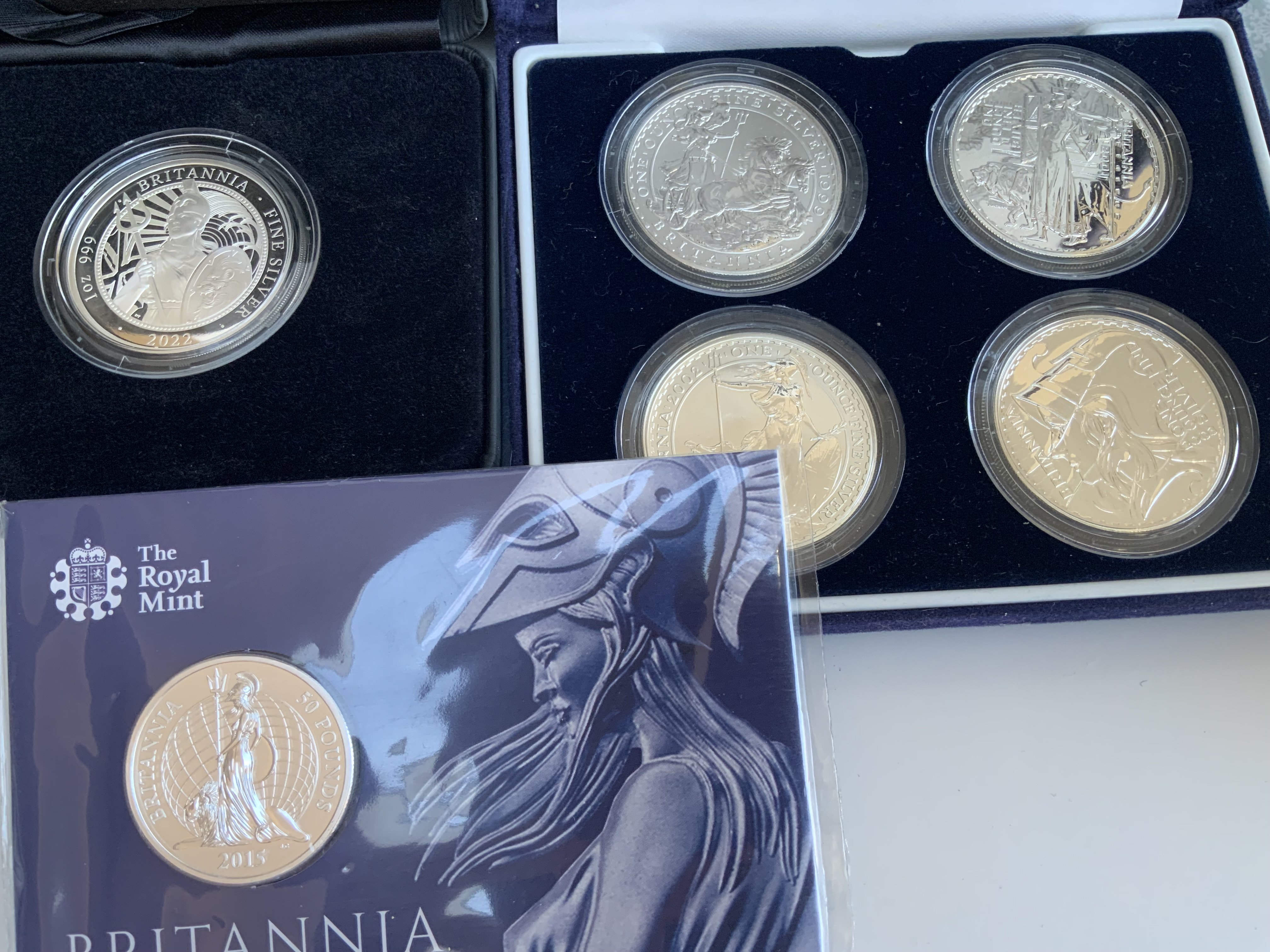 Brittania design Cased 4 coins set 1999, 2001, 2001, 2003. sealed 2000 Brittania, 2022 cased Brittania plus a Sealed Brittania &pound;50 fine silver coin. (A)
