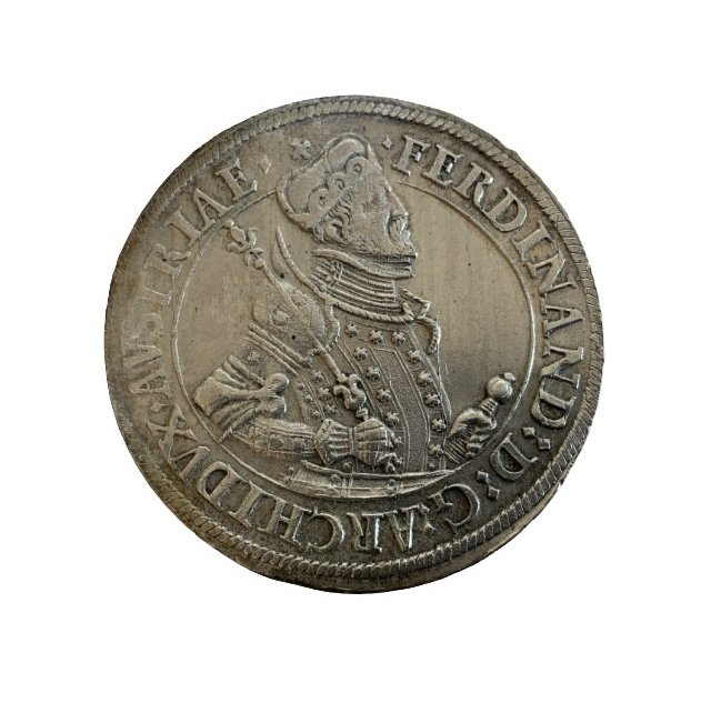 Archduke Ferdinand, 1564-1595. Thaler, Crowned bust right, holding sword and scepter. Reverse: Crowned arms in Order chain. Light toning, EXF condition. 28.95g.