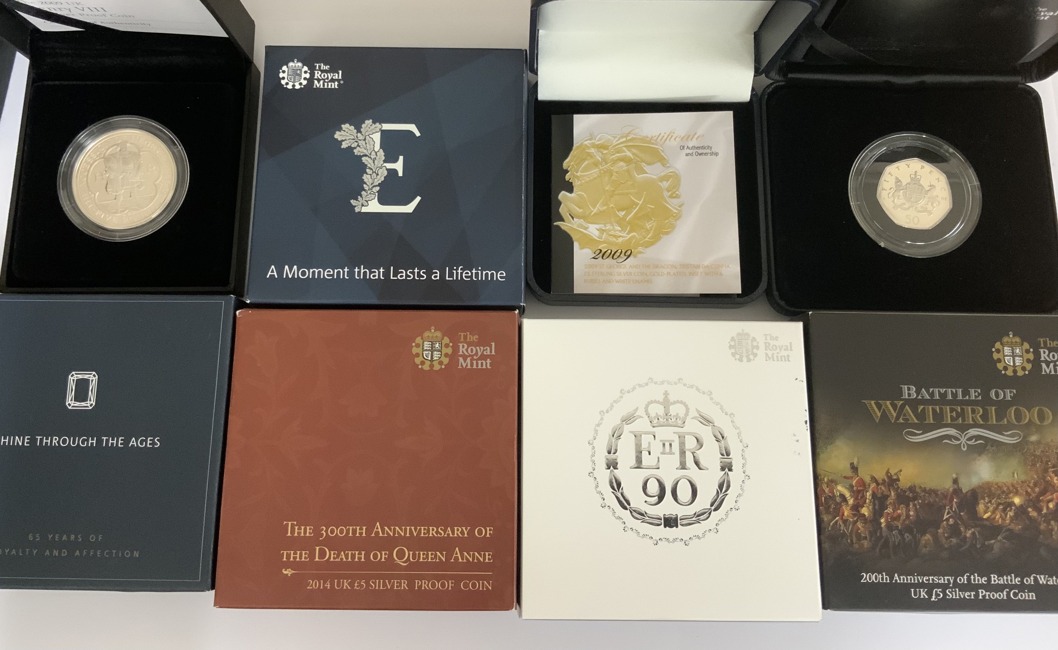 11 Silver proof presentation commemorative cased coins.