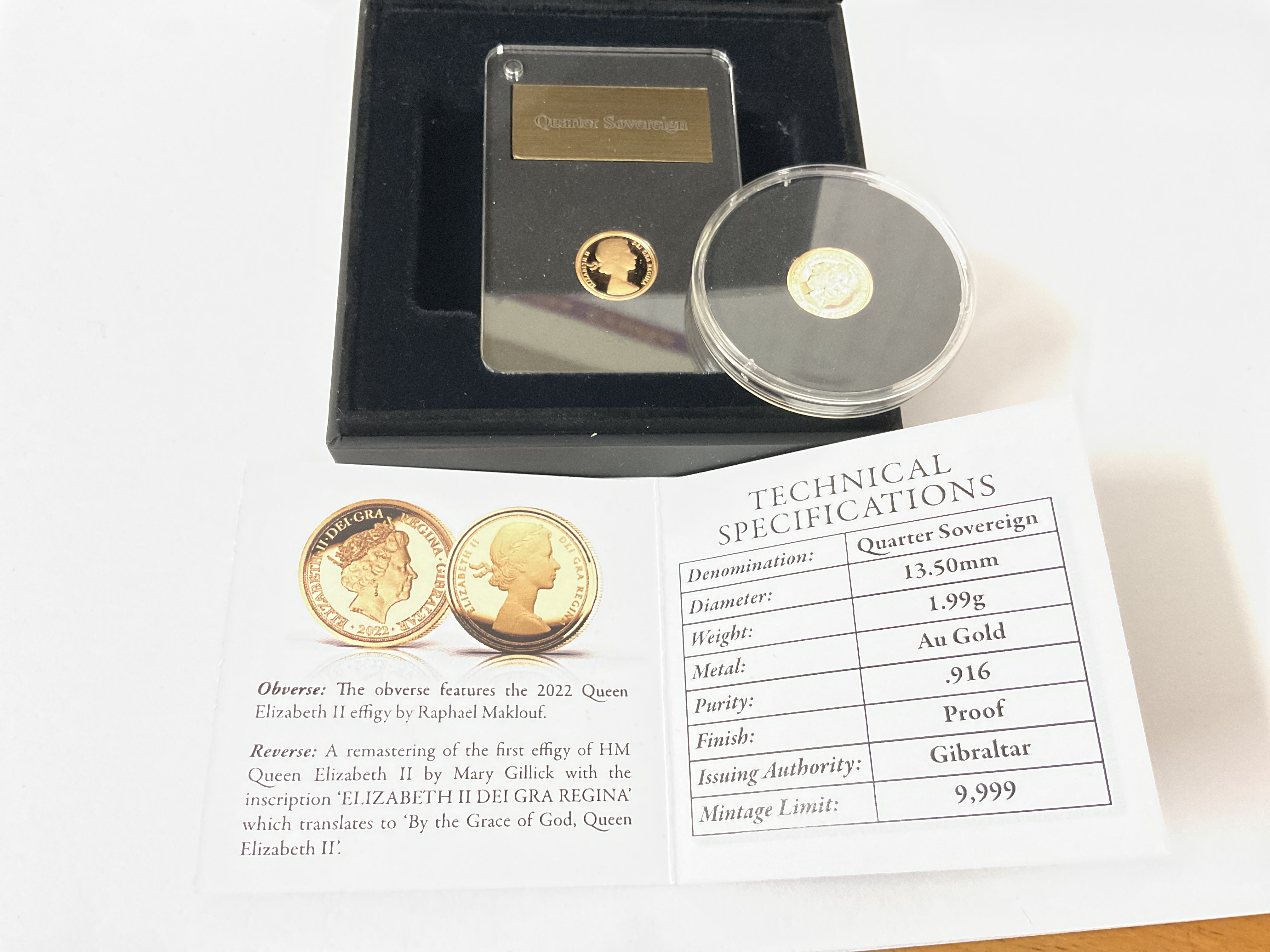 Two cased 1/4 sovereign coins, London mint issue. Postage category A