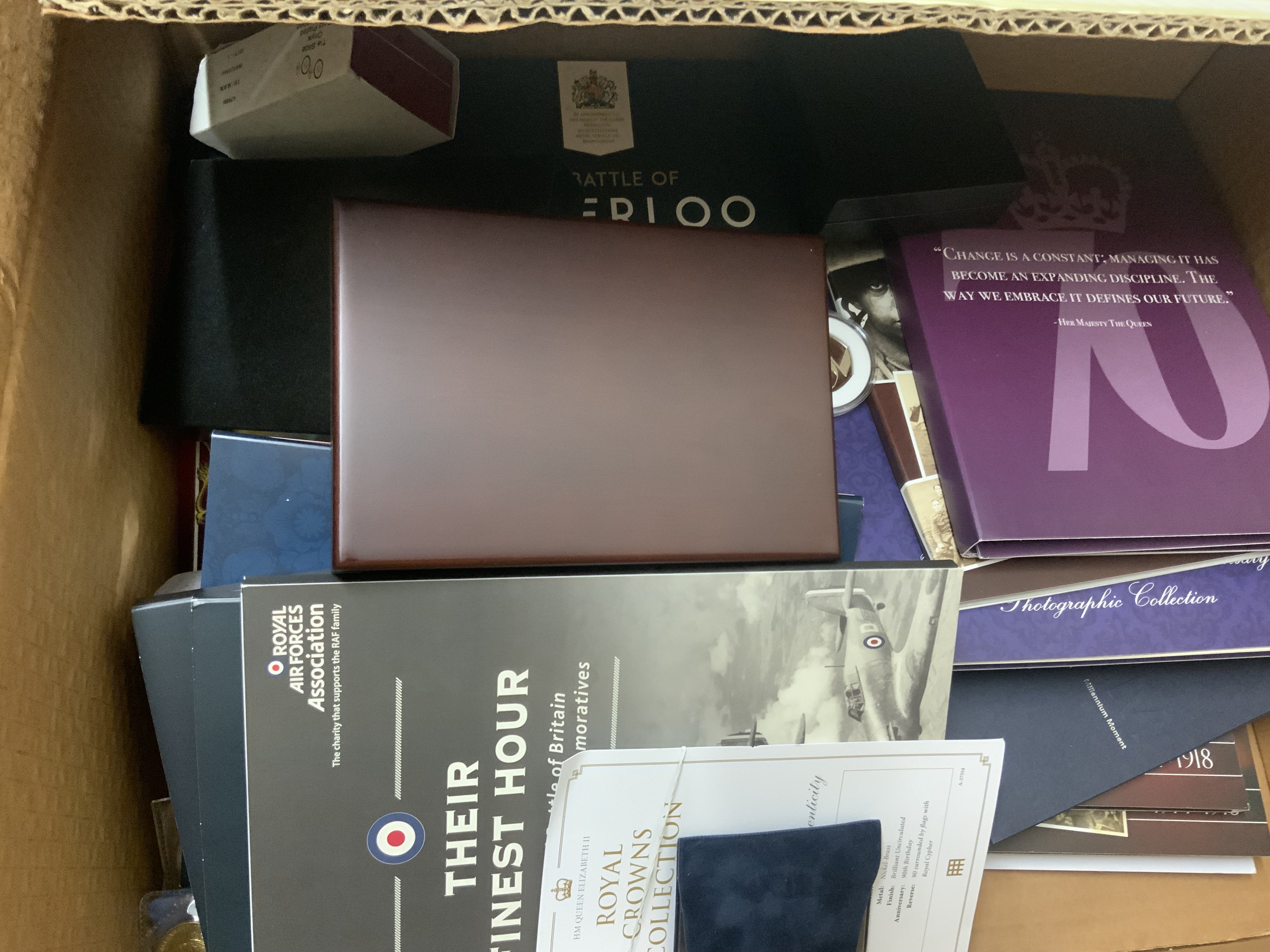 A mixed collection of presentation coinage.