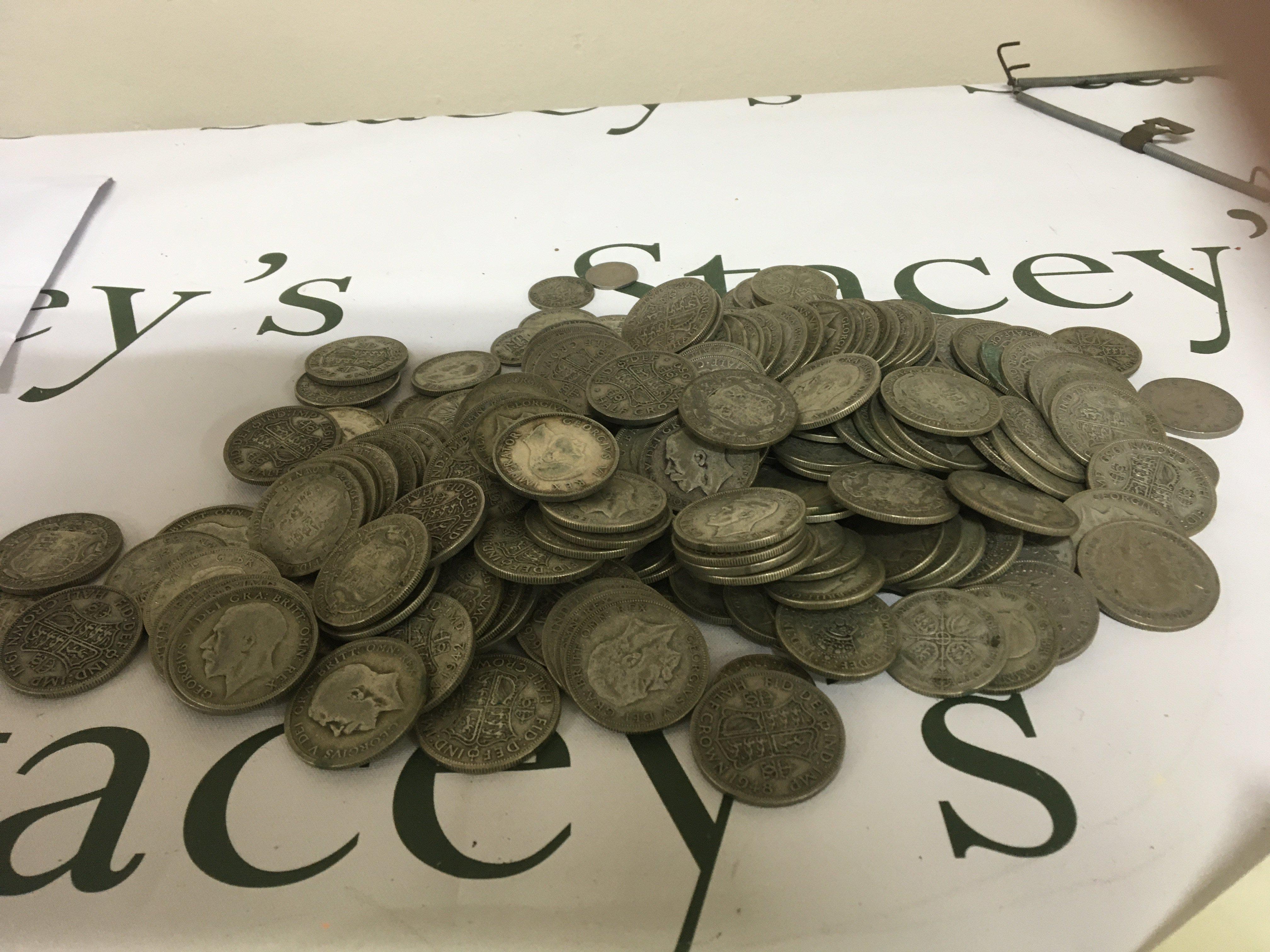 A large quantity of used circulated British coinage pre 1947. Mainly half crowns George V&VI some earlier.2.4kg approximately.