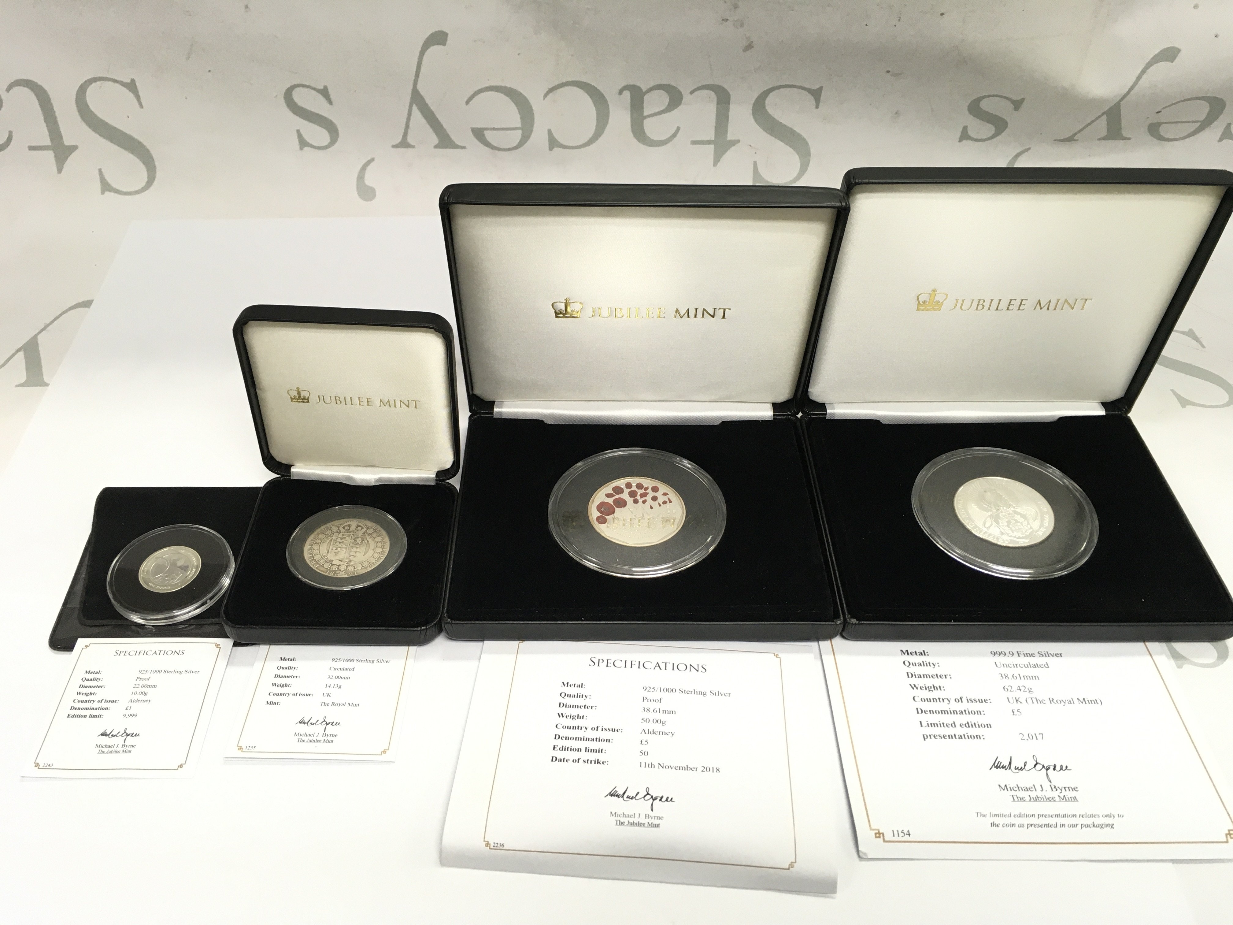 A collection of assorted silver and sterling silver coins including a 1891 half crown. Postage B