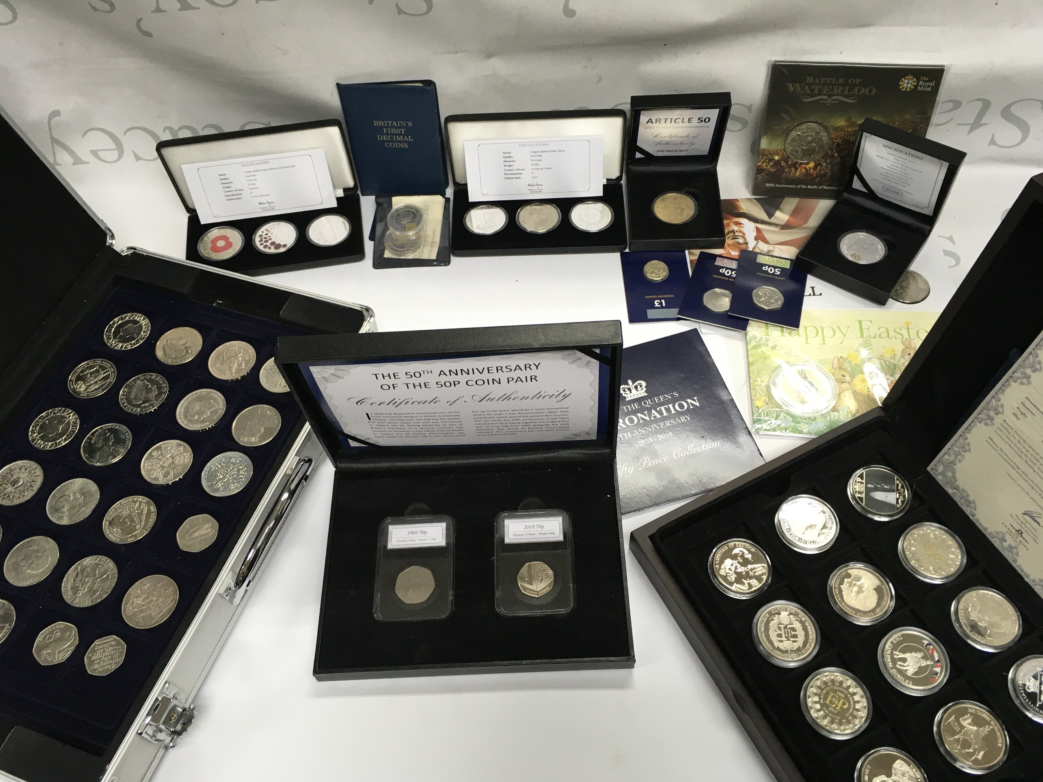 A large collection of commemorative coinage and other circulated coins including 50p and pounds.
