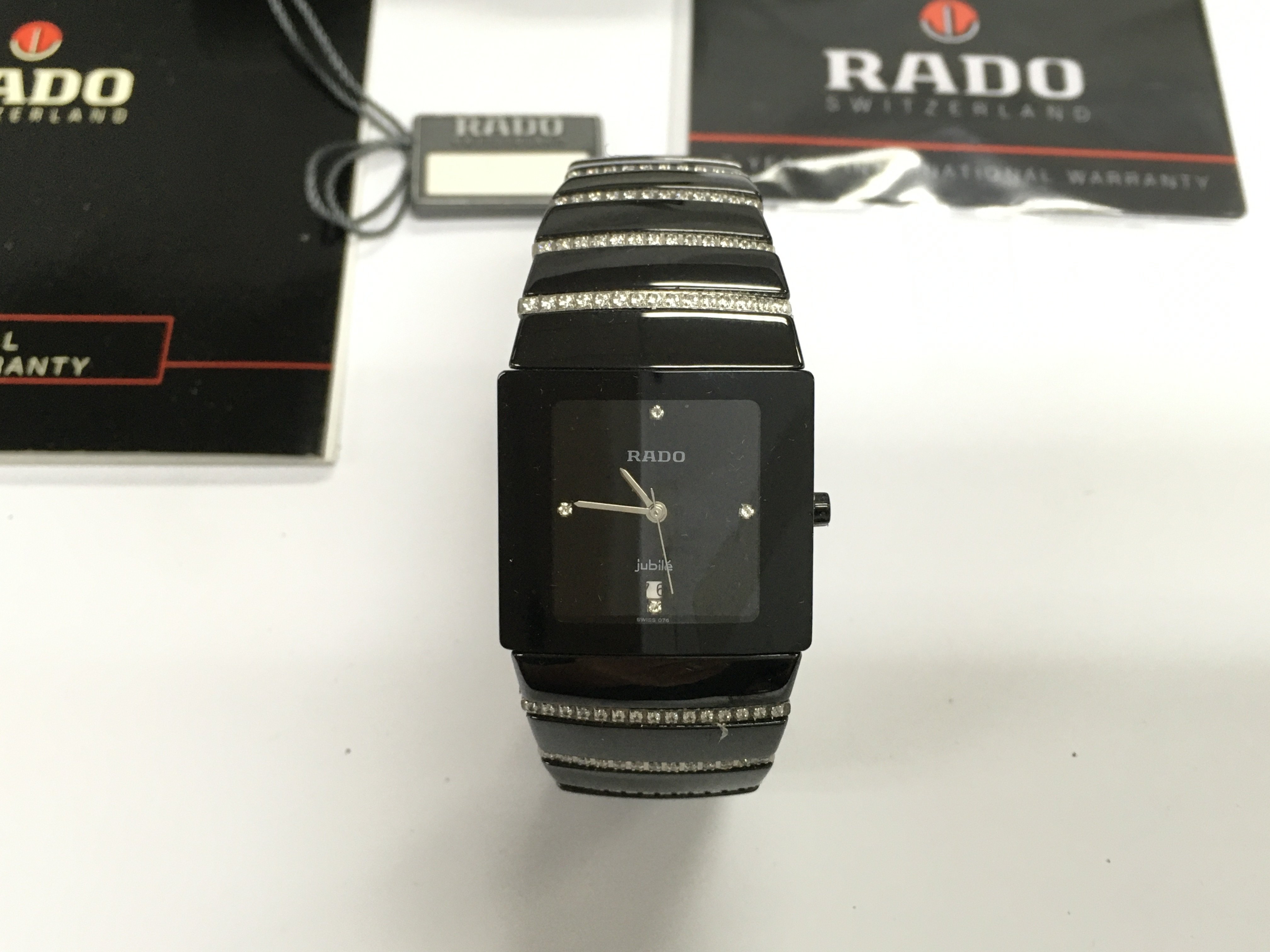 A Rado jubilee Diastar wrist watch with box and warranty card. Not seen running.