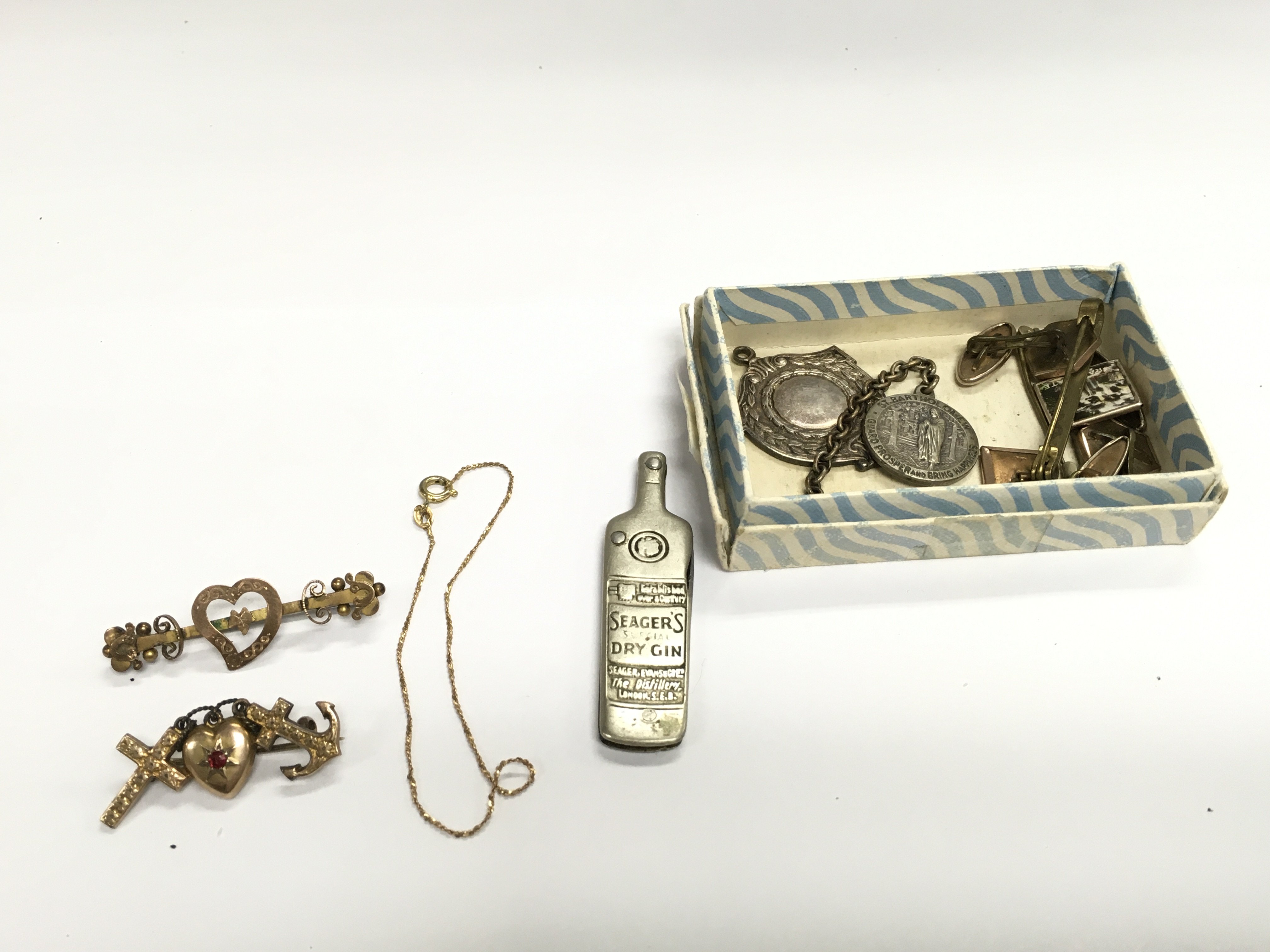 A collection of brooches and cufflinks including approximately 5g of 9ct examples.