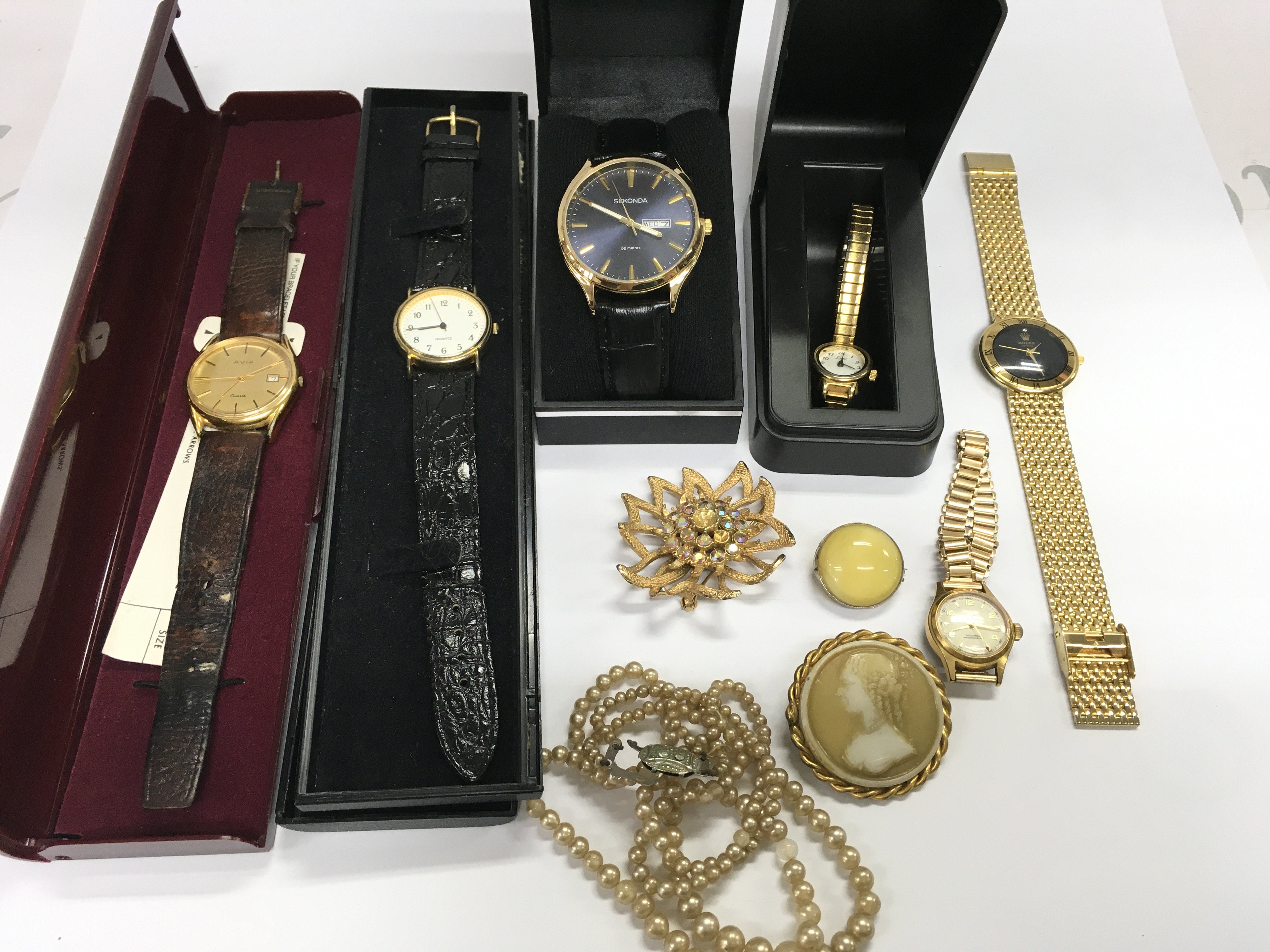 A collection of wrist watches and other jewellery. Postage B